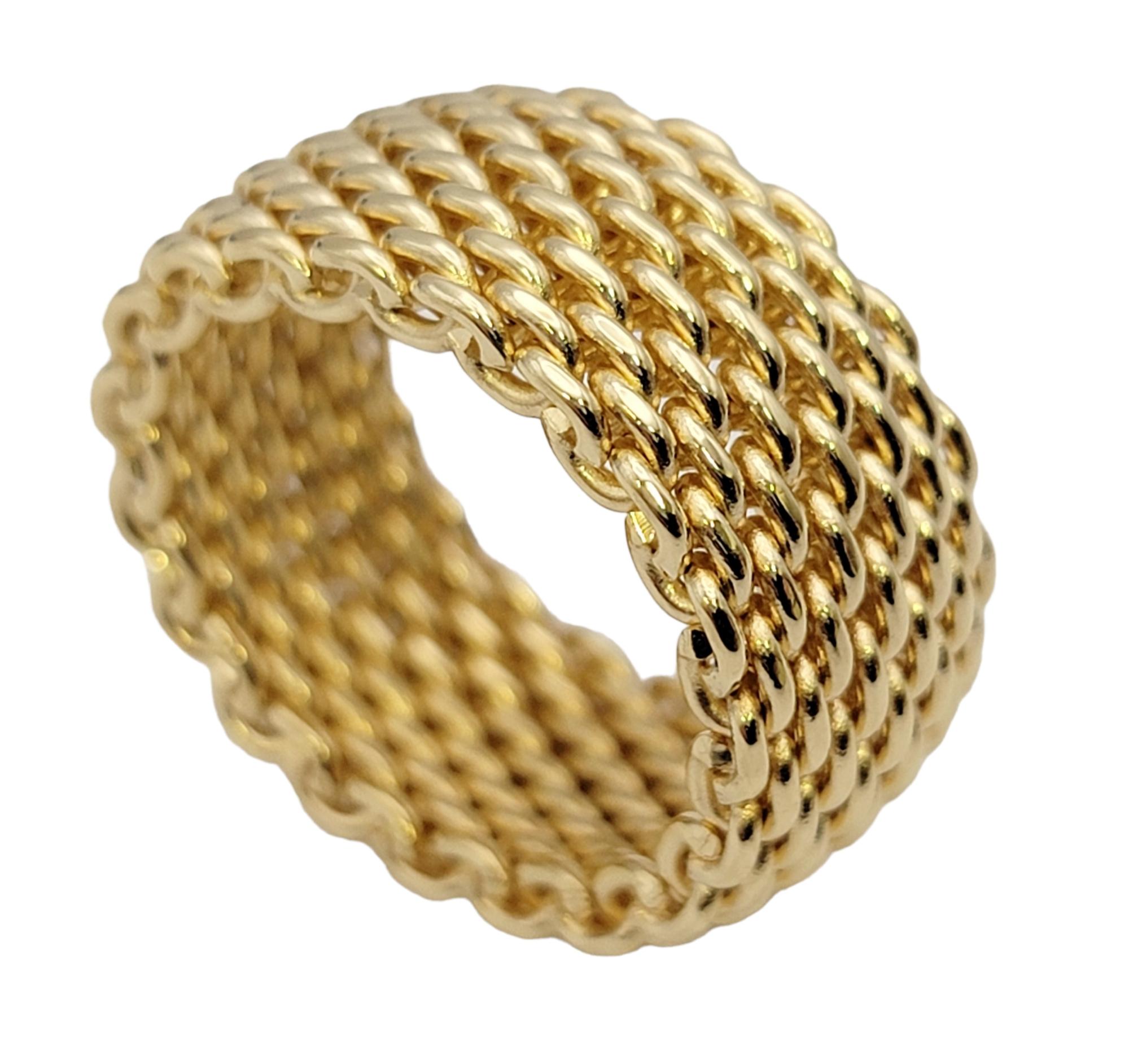 Ring size: 6.25

Simple yet stunning Somerset mesh ring by renowned jeweler, Tiffany & Co. The 18 karat yellow gold flexible mesh band boasts a sophisticated feel, while the classic simplicity gives it a timeless elegance. 

Metal: 18K Yellow