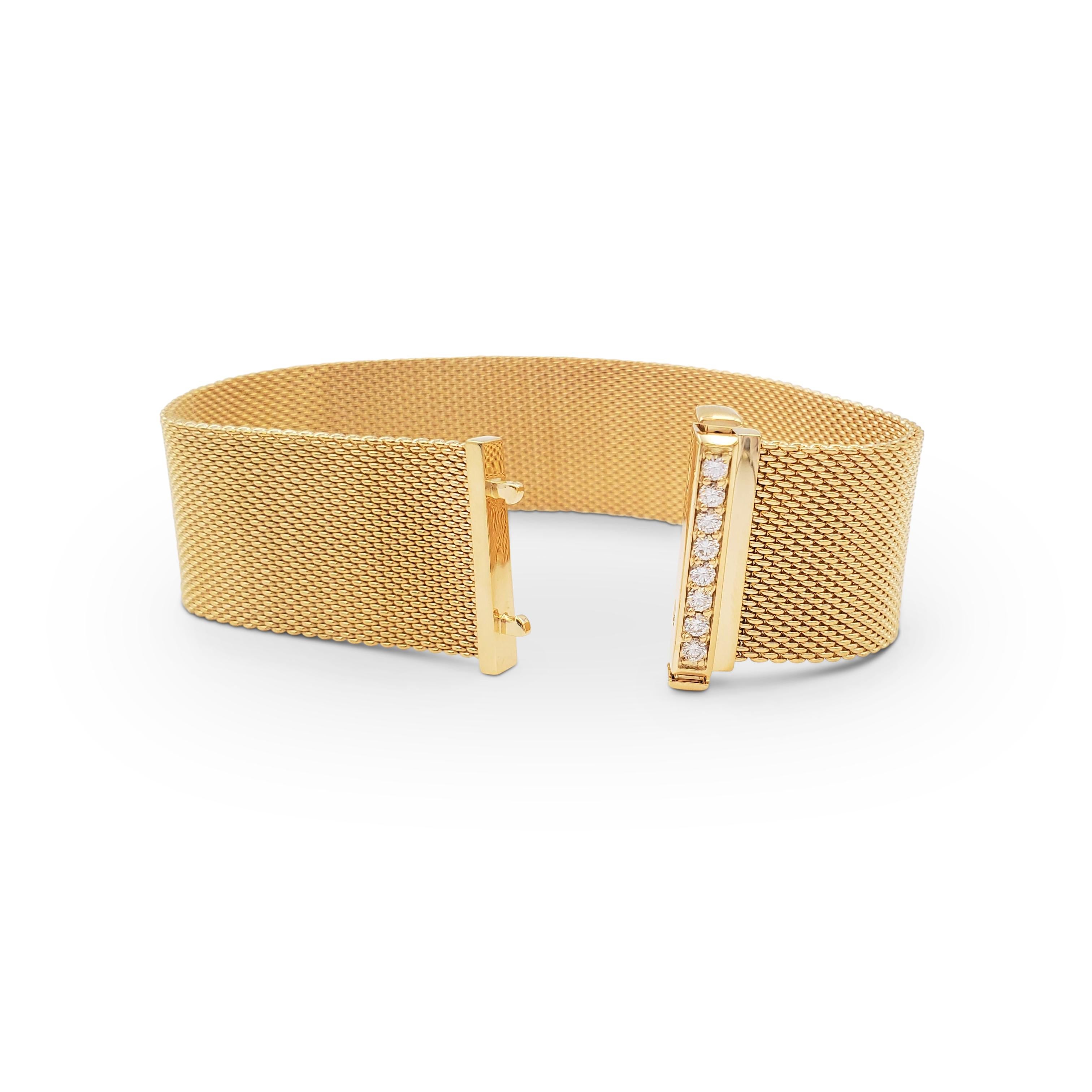 Authentic Tiffany & Co. 'Somerset' bracelet crafted in 18 karat yellow gold features a push clasp closure set with round brilliant cut diamonds (E-F color, VS clarity) weighing an estimated 0.32 carats in total. The bracelet measures 7 inches in