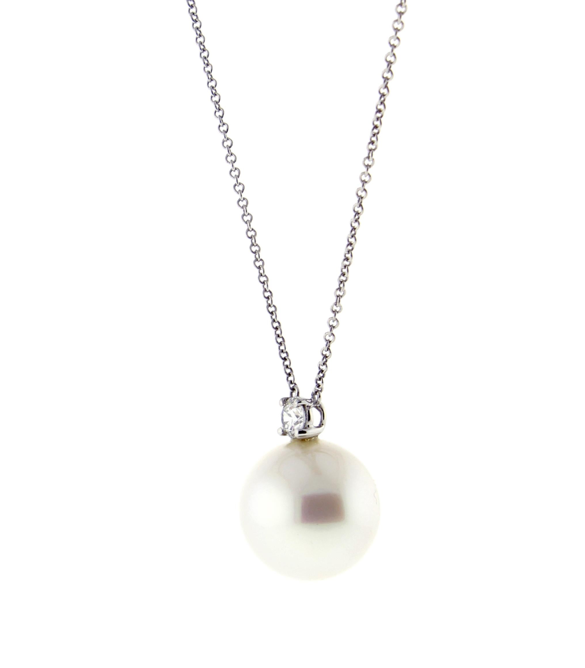 From Tiffany & Co., a south sea pearl and diamond platinum pendant.
♦ Designer: Tiffany & Co.
♦ Metal: Platinum
♦ South Sea peal = 13 X12.5mm
♦ Diamond-.17 carats
♦ Circa 2000
♦ Size 16 inch  Tiffany chain
♦ Packaging: Tiffany box and poach 
♦