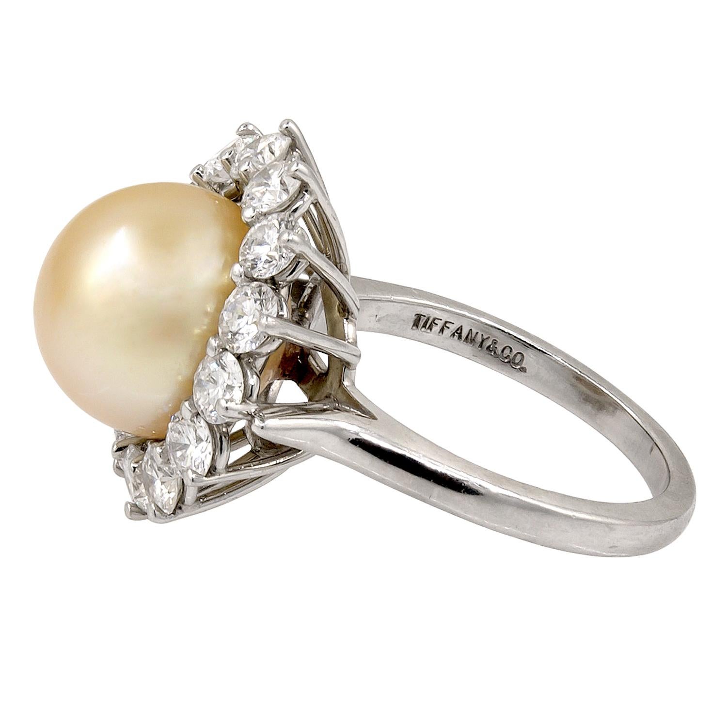 TIFFANY & Co. South Sea Pearl Diamond Platinum Ring.
Total diamond carat weight approx. 2.5 cts. and pearl approx. 11.8mm
ring size  7.75
Signed “TIFFANY & CO.“; circa 2000