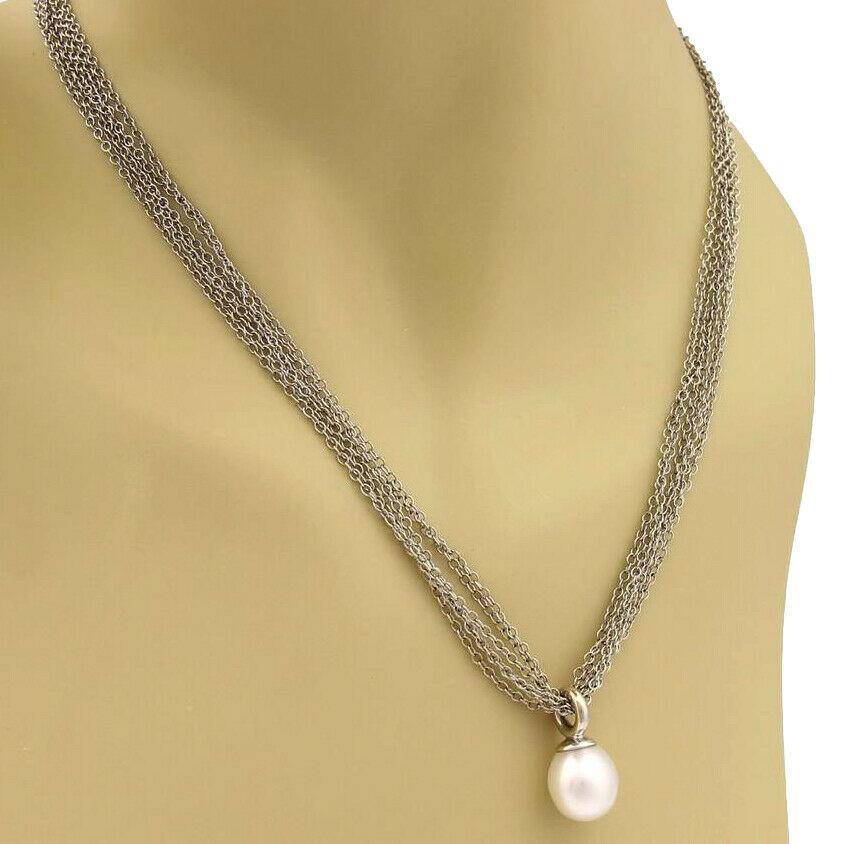 Designer: Tiffany & Co.

Style: Pendant Necklace

Metal: White Gold

Metal Purity: 18k

Stone: South Sea Pearl 

Necklace Length: 18 inches (l) x 0.10 inches (thick)

Includes: Tiffany & Co. Packaging Box