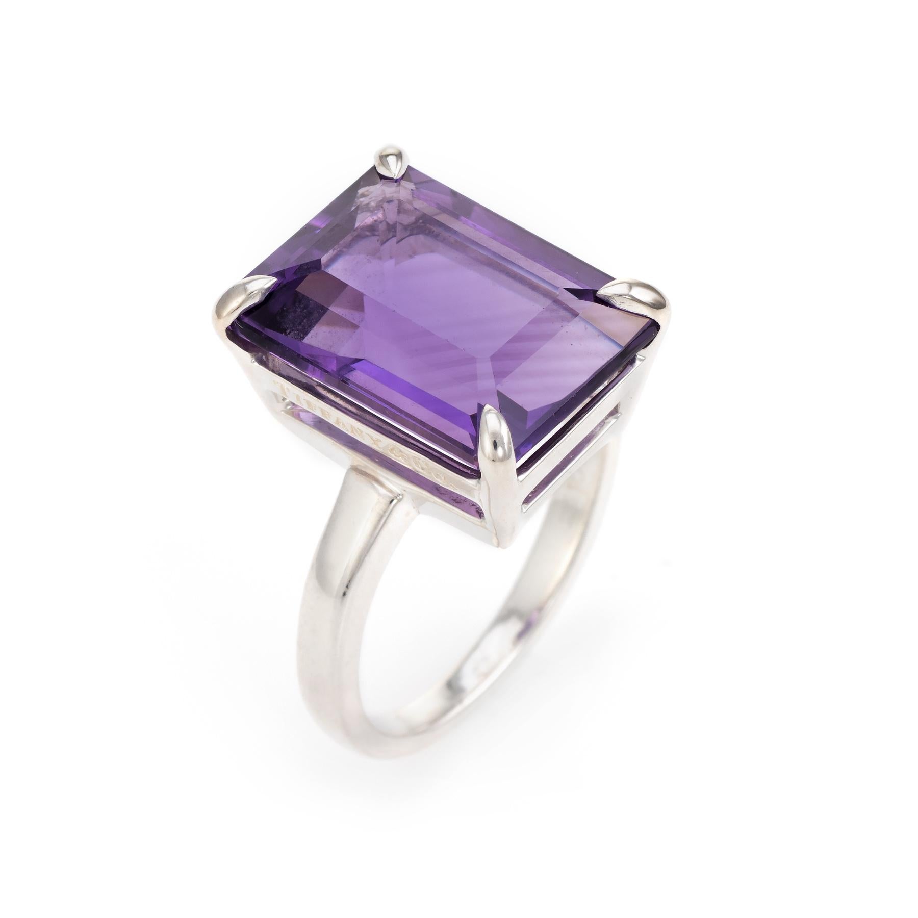 Elegant pre owned Tiffany & Co cocktail ring, crafted in 925 sterling silver. 

Centrally mounted emerald cut amethyst measures 16mm x 12mm (estimated at 9 carats). The amethyst is in excellent condition and free of cracks or chips.

The ring