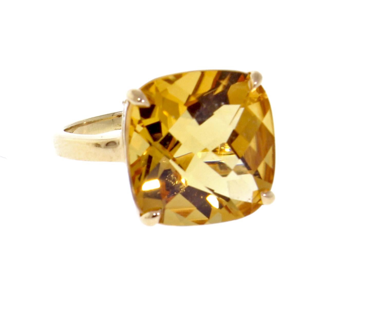 From Tiffany & Co.'s sparklers collection, a cushion shape golden citrine ring. The 18 karat ring features a citrine measureing 14mm square. Size 6