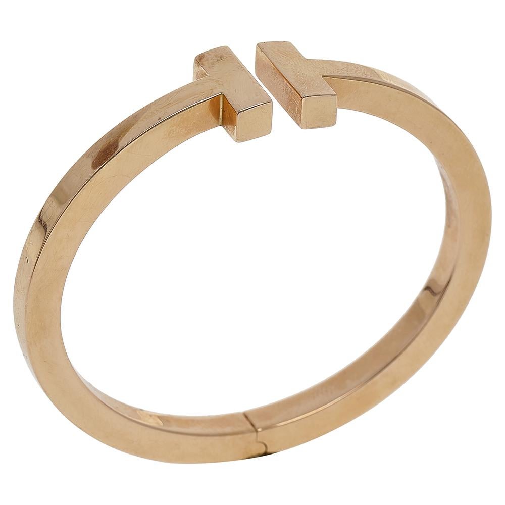 The Tiffany T collection is one of the most popular jewelry lines from Tiffany & Co. Each piece comes with a distinct shape that displays or re-interprets the 'T' symbol. This Tiffany T Square bracelet is crafted from 18K yellow gold and styled as a