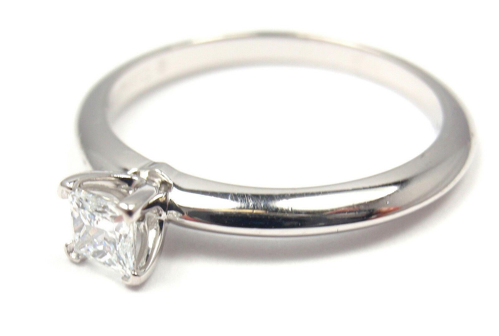 Platinum Diamond Engagement Ring by Tiffany & Co. 
With 1x Diamond
0.22ct clarity VS2, color D
Cut: Excellent
Polish: Excellent
Symmetry: Excellent
Fluorescence: NONE
Includes Tiffany & Co Diamond Certificate and a Box.
Details:
Ring Size: 6, Resize