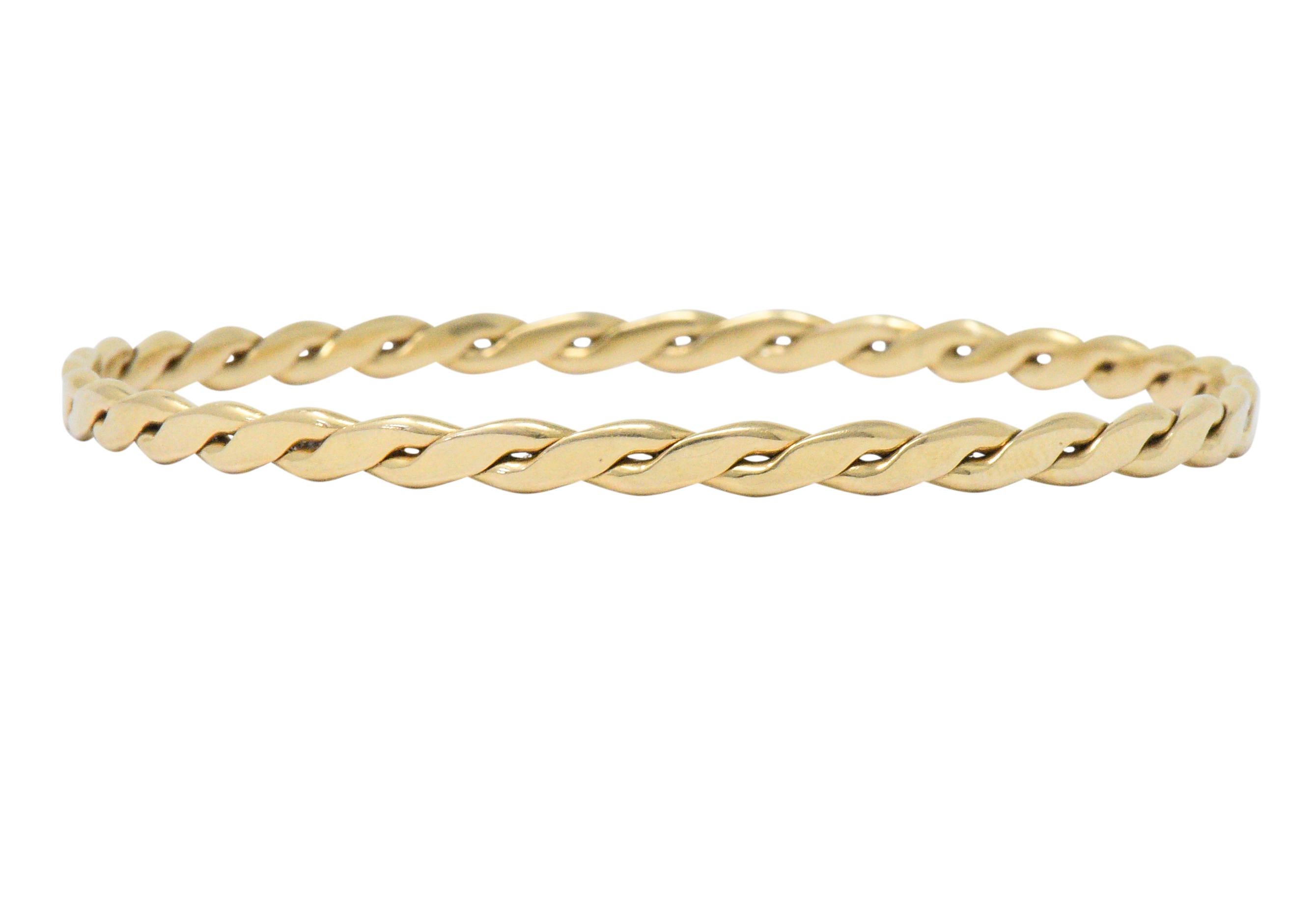 Modern Tiffany & Co. Stackable 14 Karat Gold Entwined Bangle Bracelet