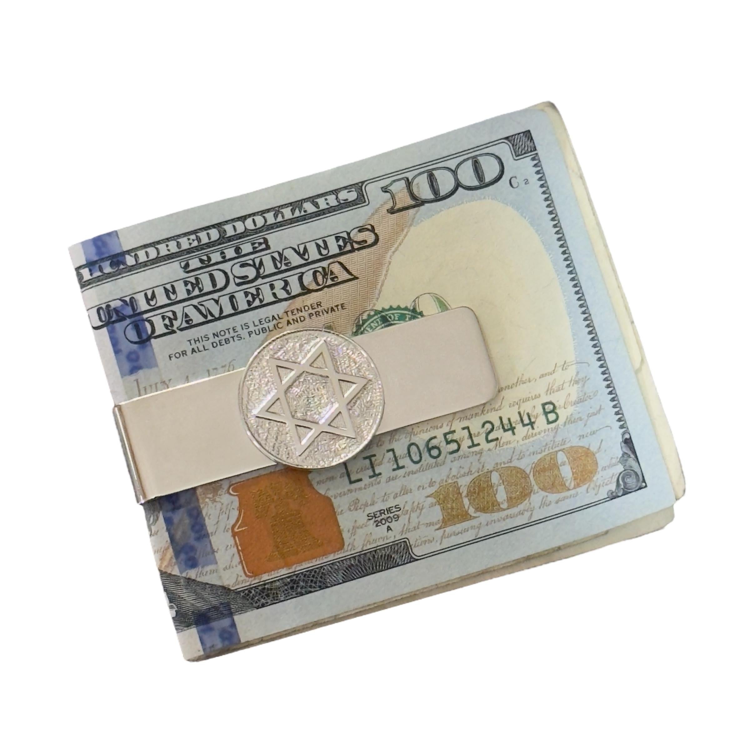 Authentic Tiffany & Co Star Of David Money Clip Sterling Silver Estate TIF907

Elevate your essentials with this elegant Tiffany & Co. money clip featuring the Star of David.

A refined symbol of heritage and faith, crafted in shimmering sterling