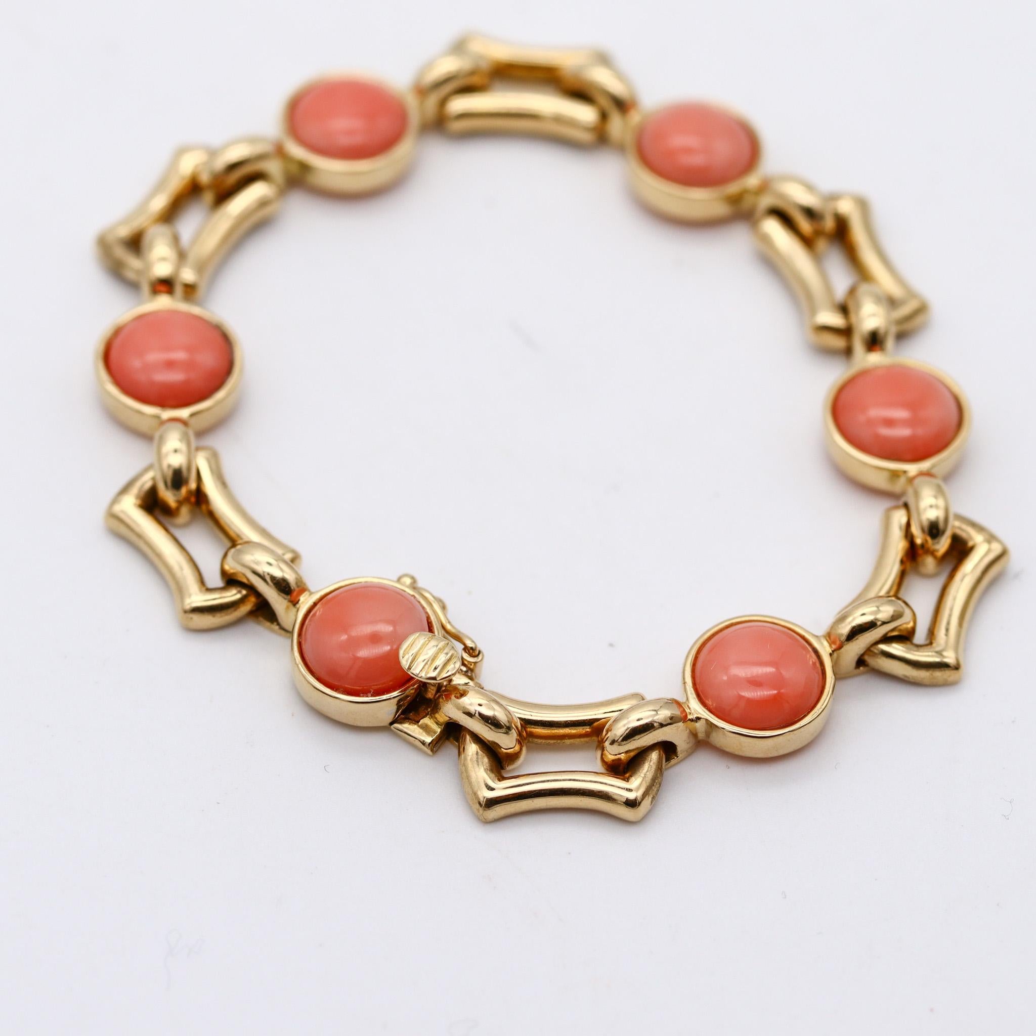 Station corals bracelet designed by Tiffany & Co.

An elegant modernist stations bracelet, created in New York city by Tiffany & Co. This sleek vintage piece of jewelry was carefully crafted in solid yellow and white gold of 18 karats and is fitted