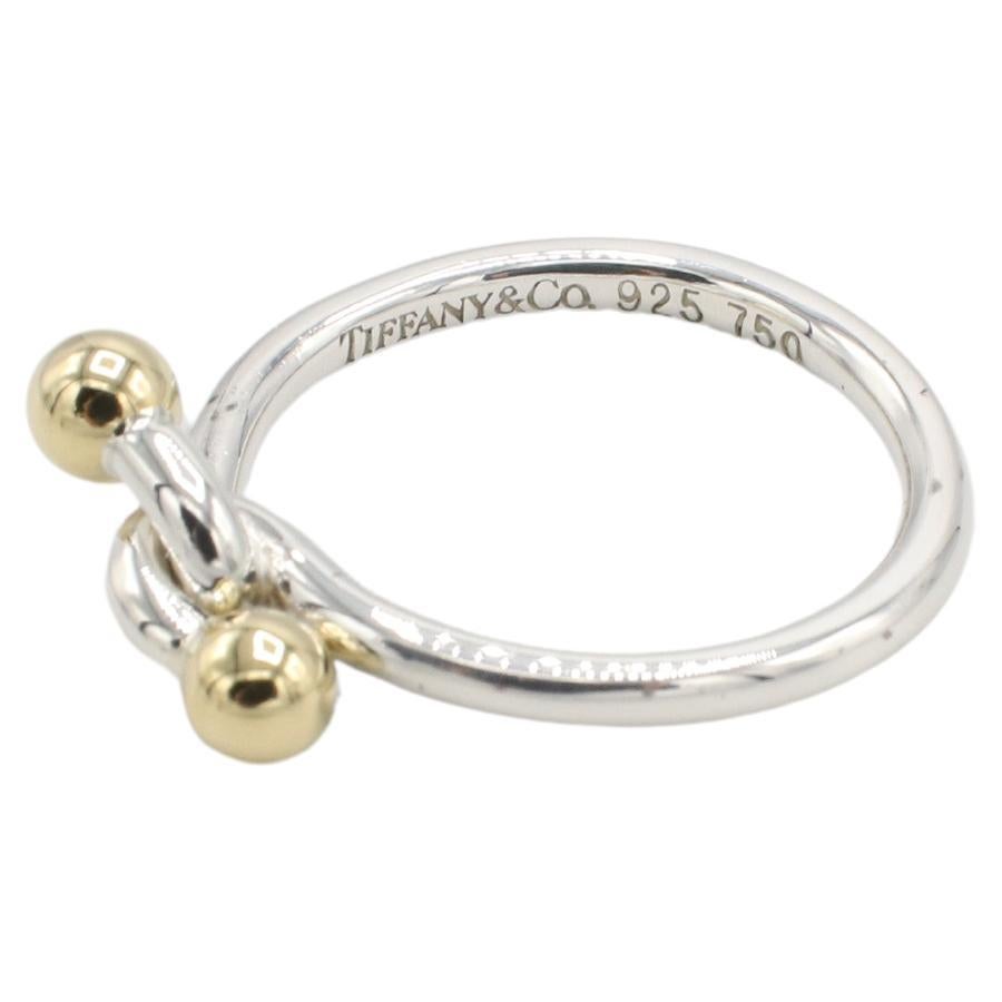 Modern Tiffany & Co. Stelring Silver & Gold Ball and Hook Bypass Ring For Sale
