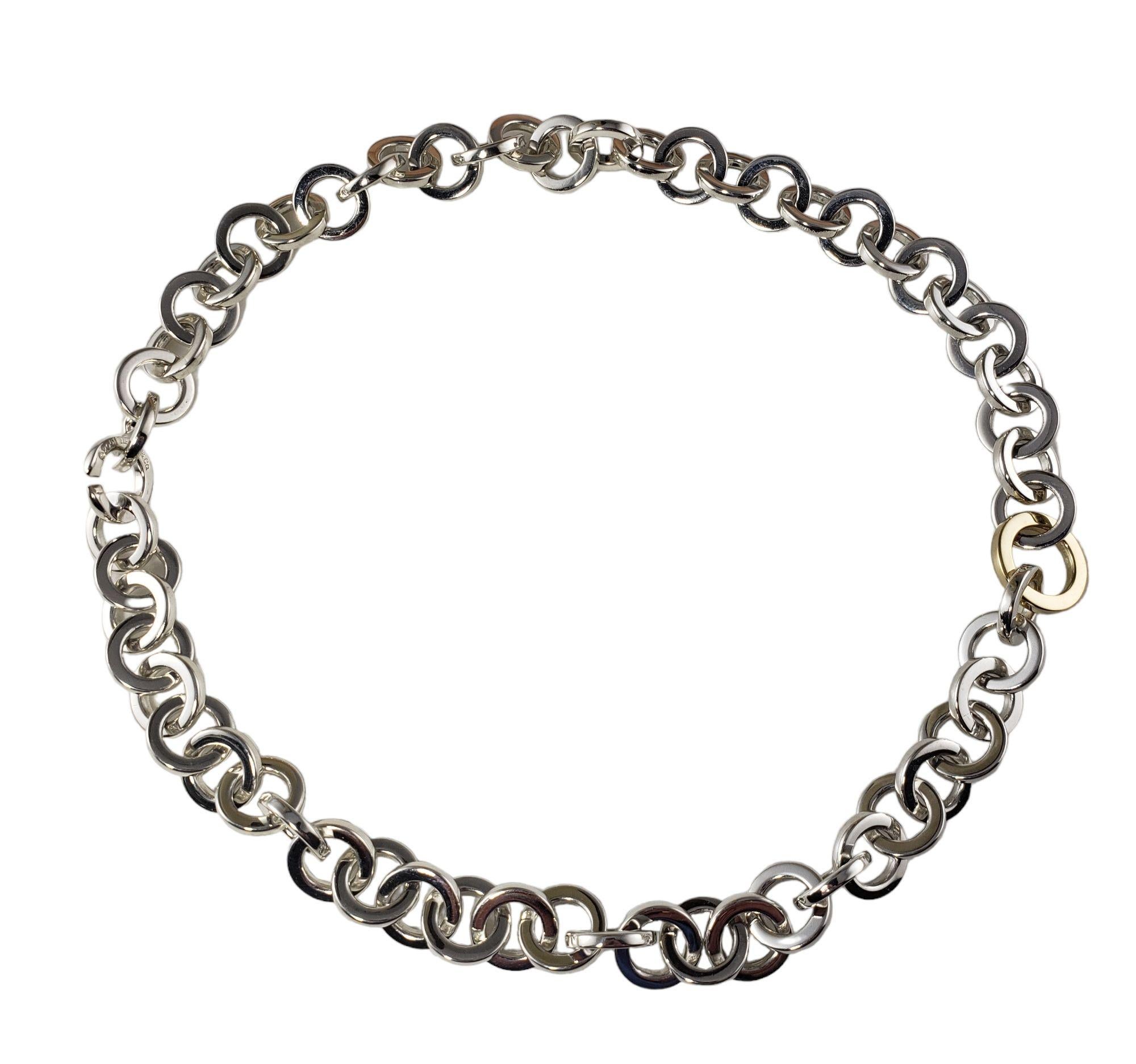 Tiffany & Co. Sterling Silver and 18 Karat Yellow Gold Open Circle Necklace-

This elegant necklace by Tiffany & Co. is crafted in beautifully detailed sterling silver and 18K yellow gold. Width: 15 mm.

* Matching bracelet: RL-00014283

Size: 16
