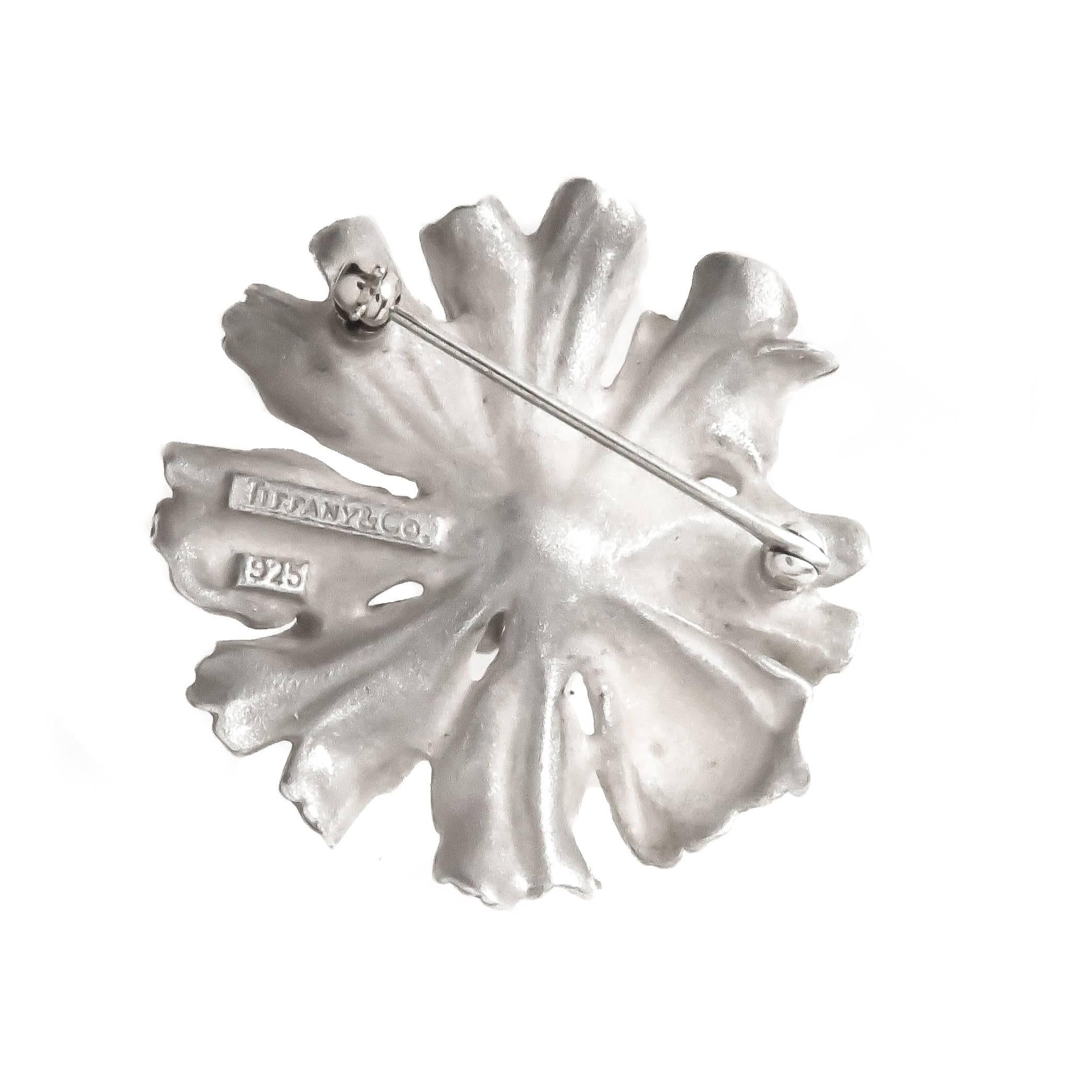 Circa 1990s Tiffany & Company Sterling Silver Alpine Rose Flower Brooch. Measuring 1 1/2 inches in diameter. Very Detailed and in excellent, unworn condition. 