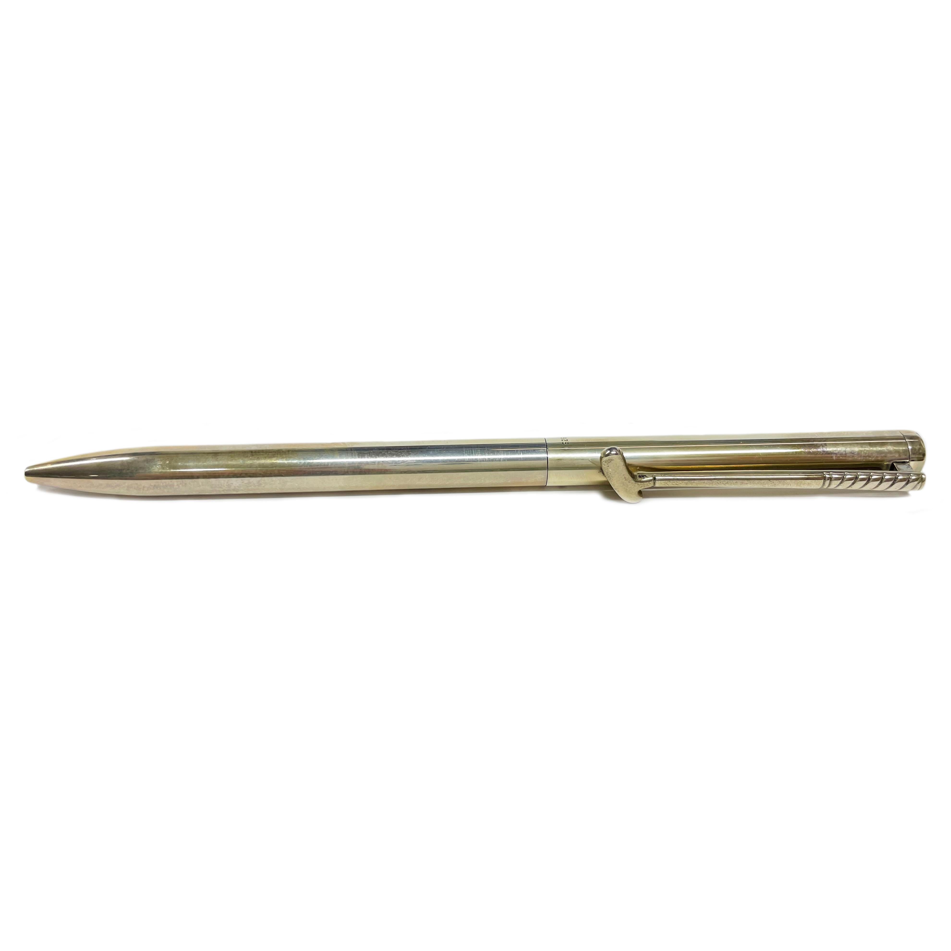 Tiffany & Co. Sterling Golf Putter Ballpoint Pen. The perfect gift for the golfer or golf enthusiast. Simple and elegant design with the pen clip being a gold putter. The original Tiffany blue box is included with the pen purchase as well as the
