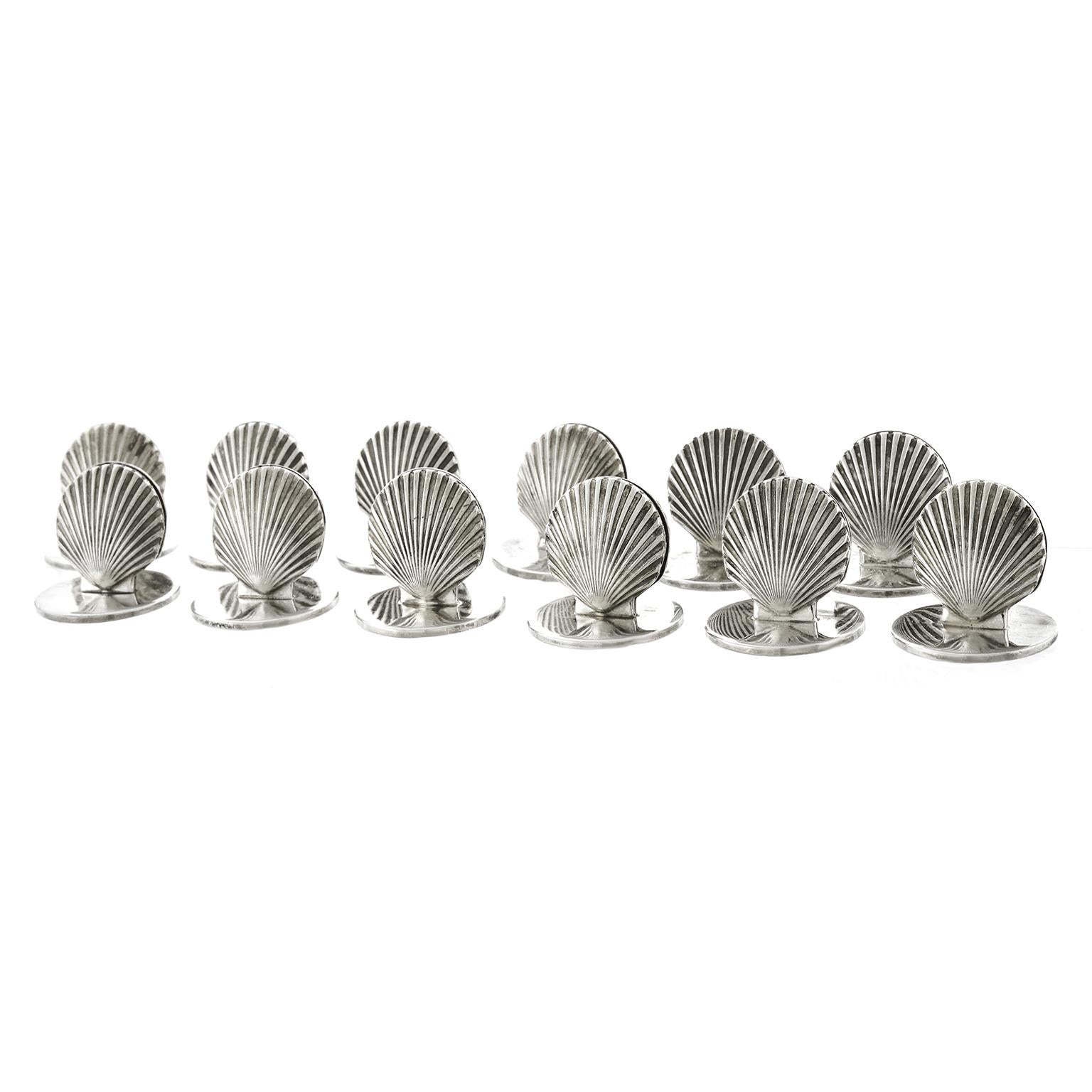 Sterling, Tiffany & Co., New York, New York, circa 1960s. Set of 12 sterling shell motif placecard holders. Tiffany Sterling is the pinnacle of American silver. It has a look and feel that is beyond compare. The shell motif of these place card