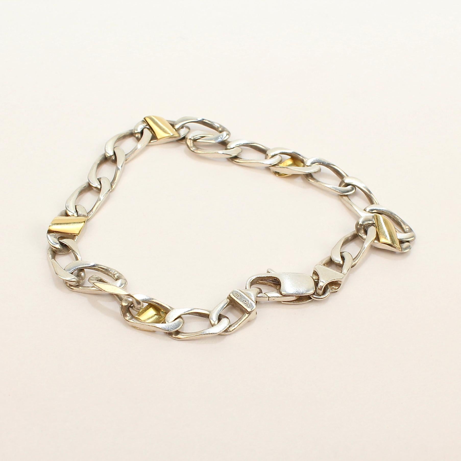 A fine Tiffany & Co. curb link bracelet

In sterling silver with 18k gold sections.

Great Tiffany design!

Date:
20th Century

Overall Condition:
It is in overall good, as-pictured, used estate condition with some very fine & light surface