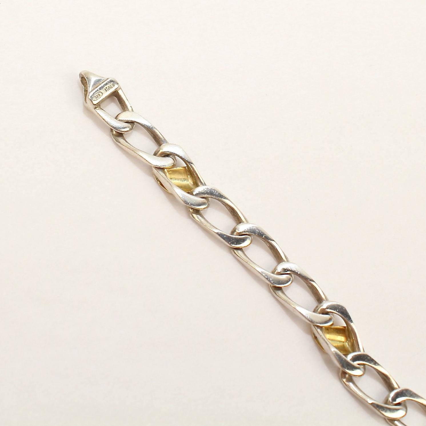 Modern Tiffany & Co. Sterling Silver and 18 Karat Gold Curb Link Bracelet