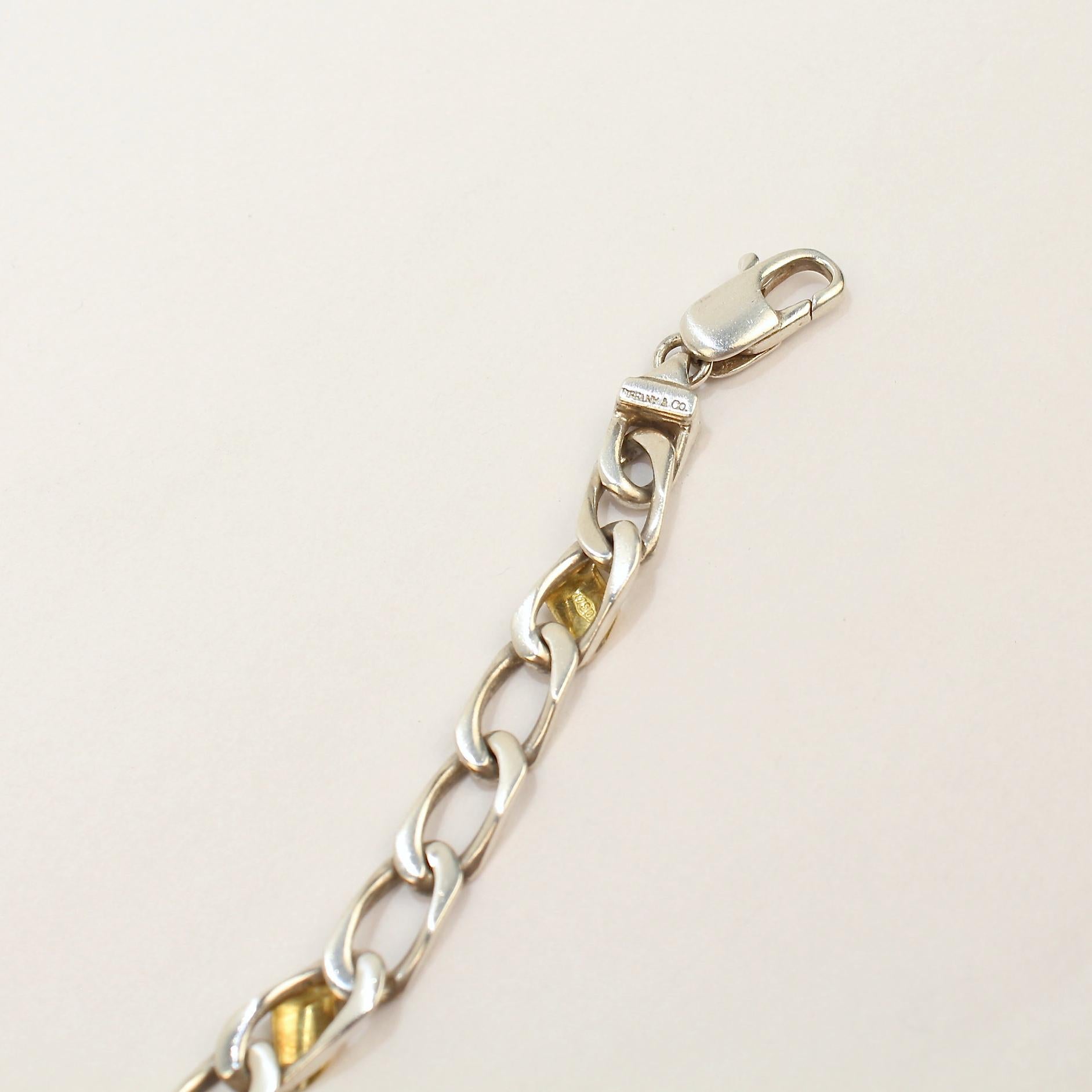 Tiffany & Co. Sterling Silver and 18 Karat Gold Curb Link Bracelet In Good Condition In Philadelphia, PA