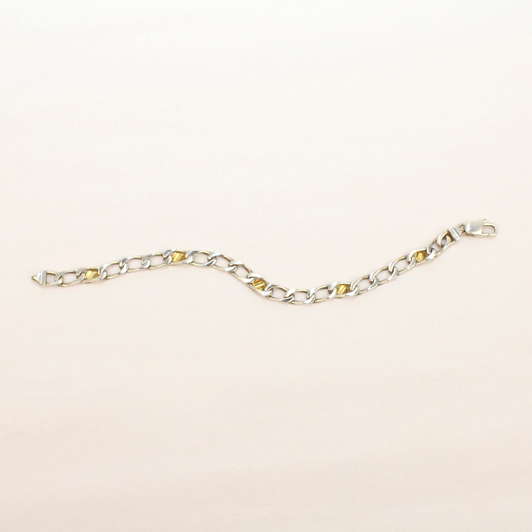 Women's or Men's Tiffany & Co. Sterling Silver and 18 Karat Gold Curb Link Bracelet