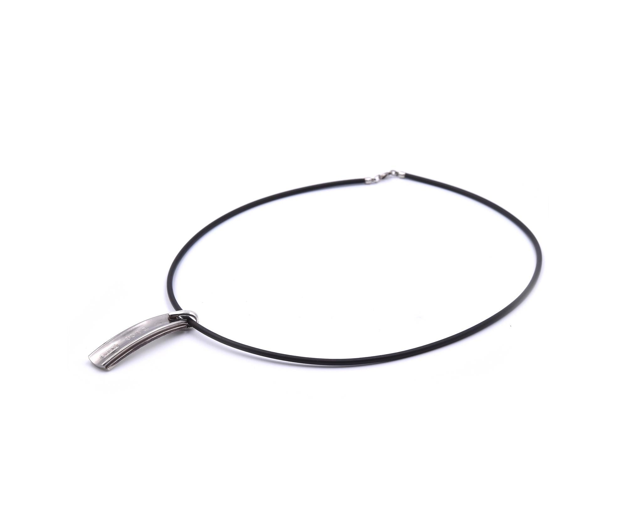 Designer: Tiffany & Co. 
Material: sterling silver and rubber
Dimensions: necklace is 20”-inches long and pendant is 2”-inches long and 12mm wide
Weight:  15.35 grams
