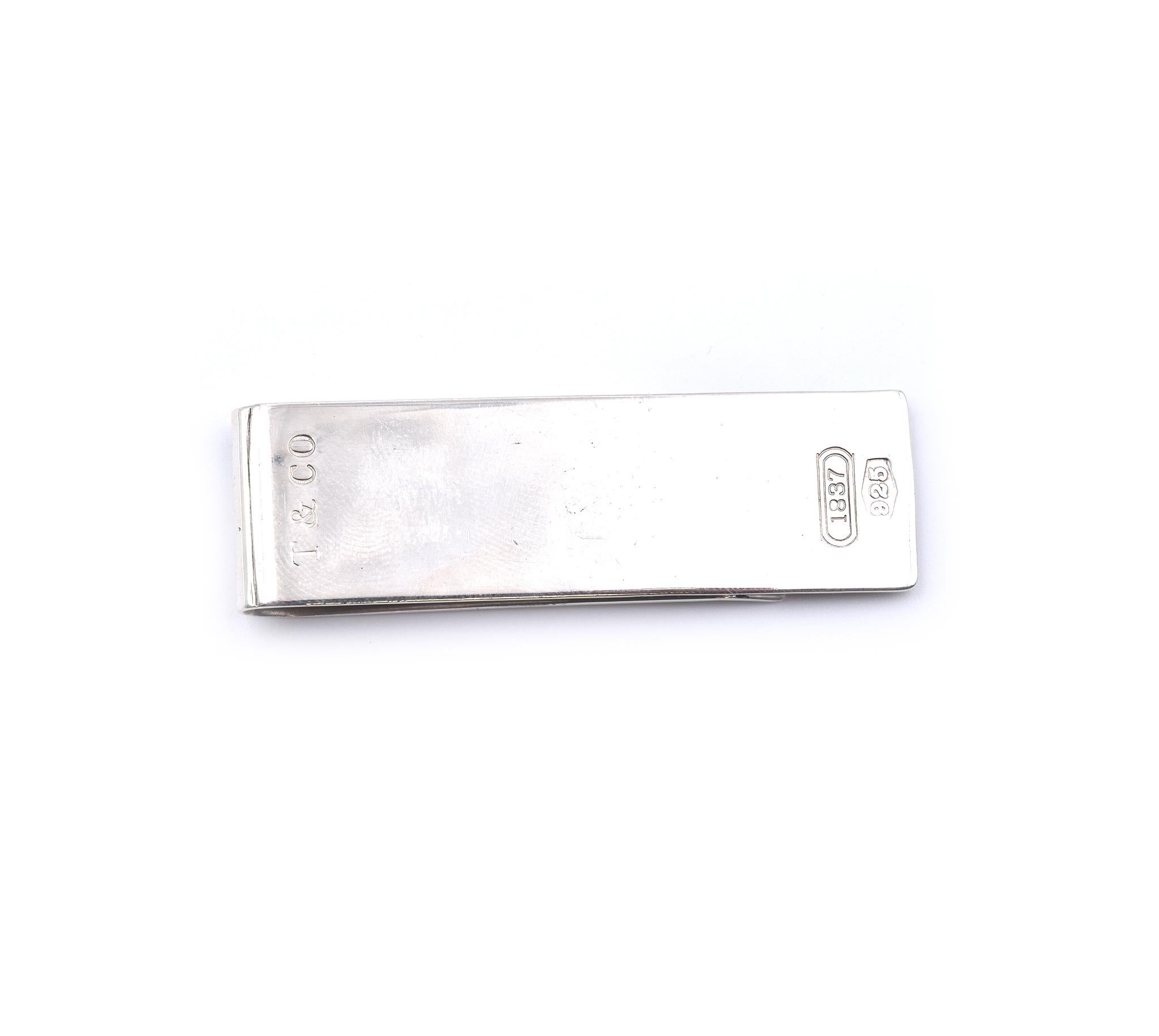 Designer: Tiffany & Co. 
Material: sterling silver 
Dimensions: money clip is 60.58mm by 18.30mm
Weight:  20.98 grams
