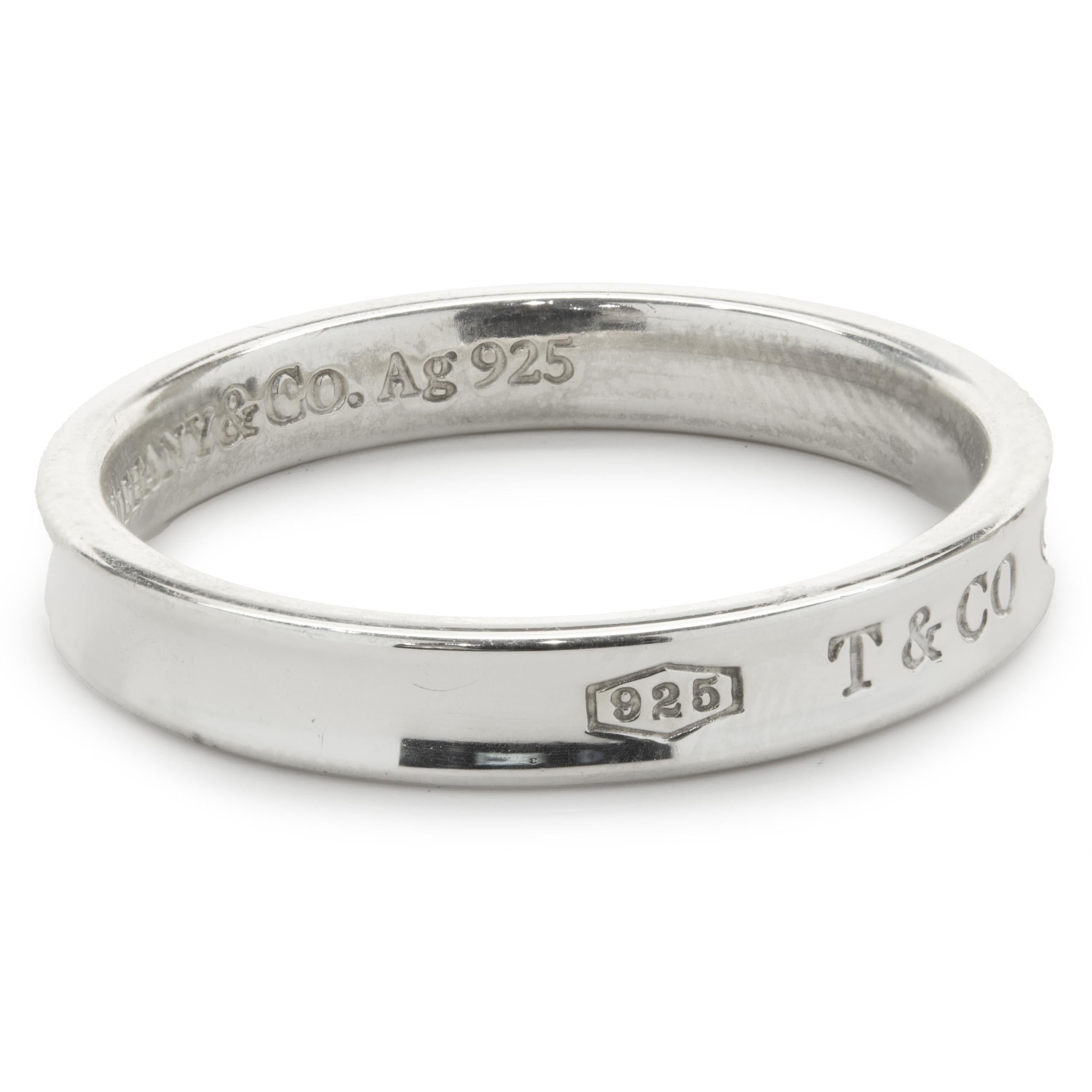 Designer: Tiffany & Co.
Material: Sterling Silver
Dimensions: ring measures 4mm wide
Size: 12
Weight: 4.91 grams