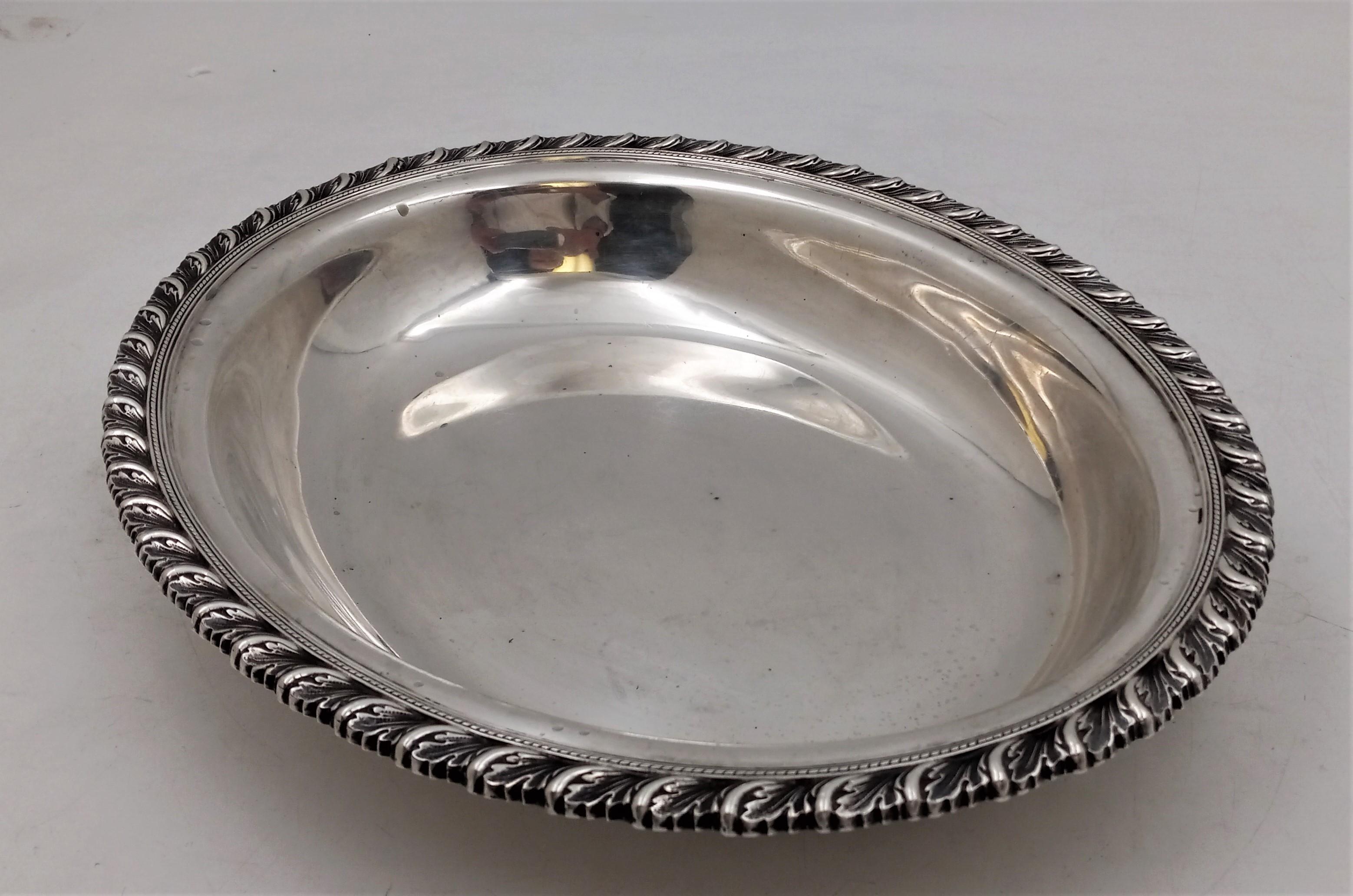 Tiffany & Co. sterling silver bowl in pattern 7545 from 1883, measuring 11 1/4'' in length by 8 3/4'' in width by 1 1/2'' in height, weighing 20.6 troy ounces, and bearing hallmarks as shown. 

Founded in 1837 by Charles Lewis Tiffany and John B.