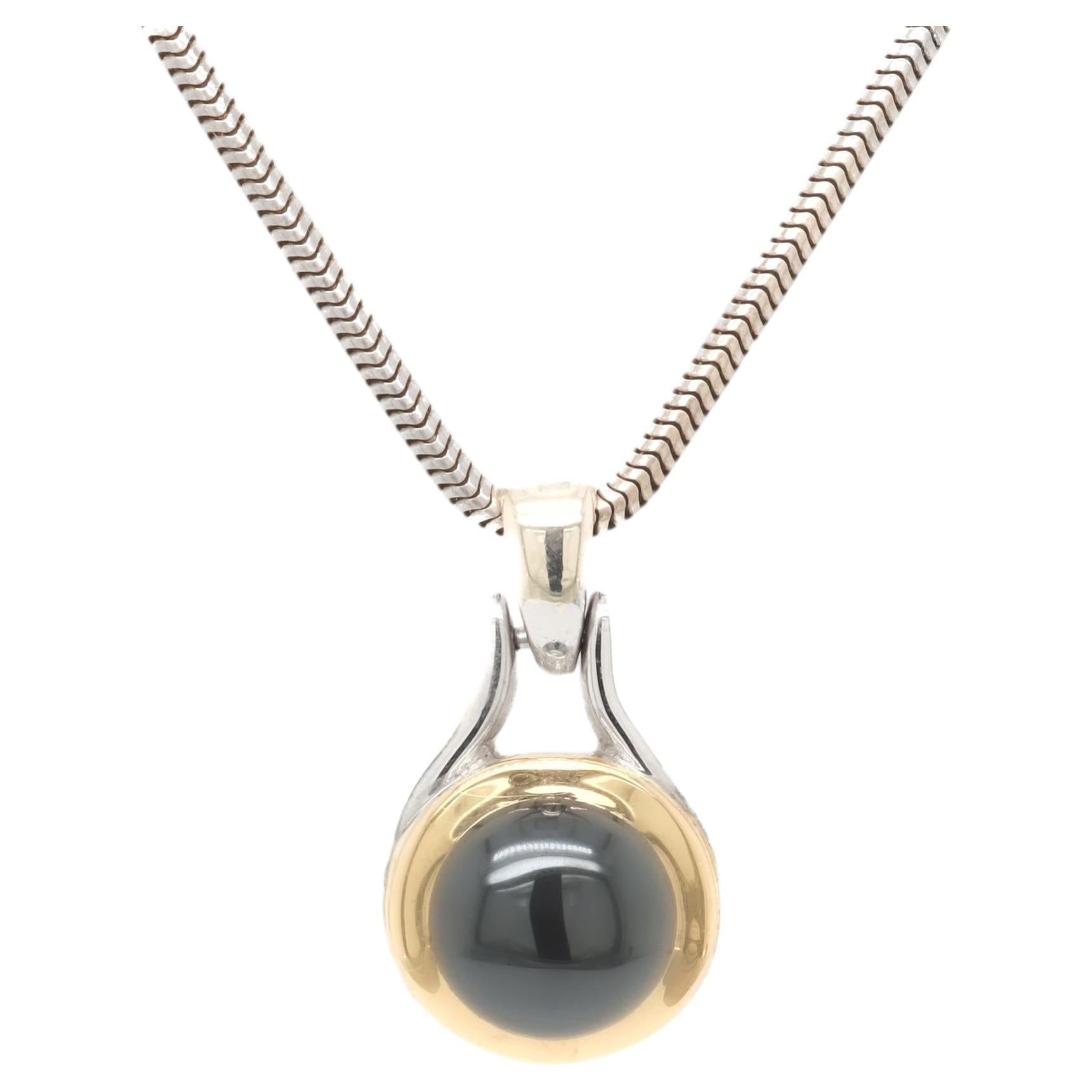 Tiffany & Co. Sterling Silver, 18K Gold, & Hematite Cabochon Pendant Necklace For Sale