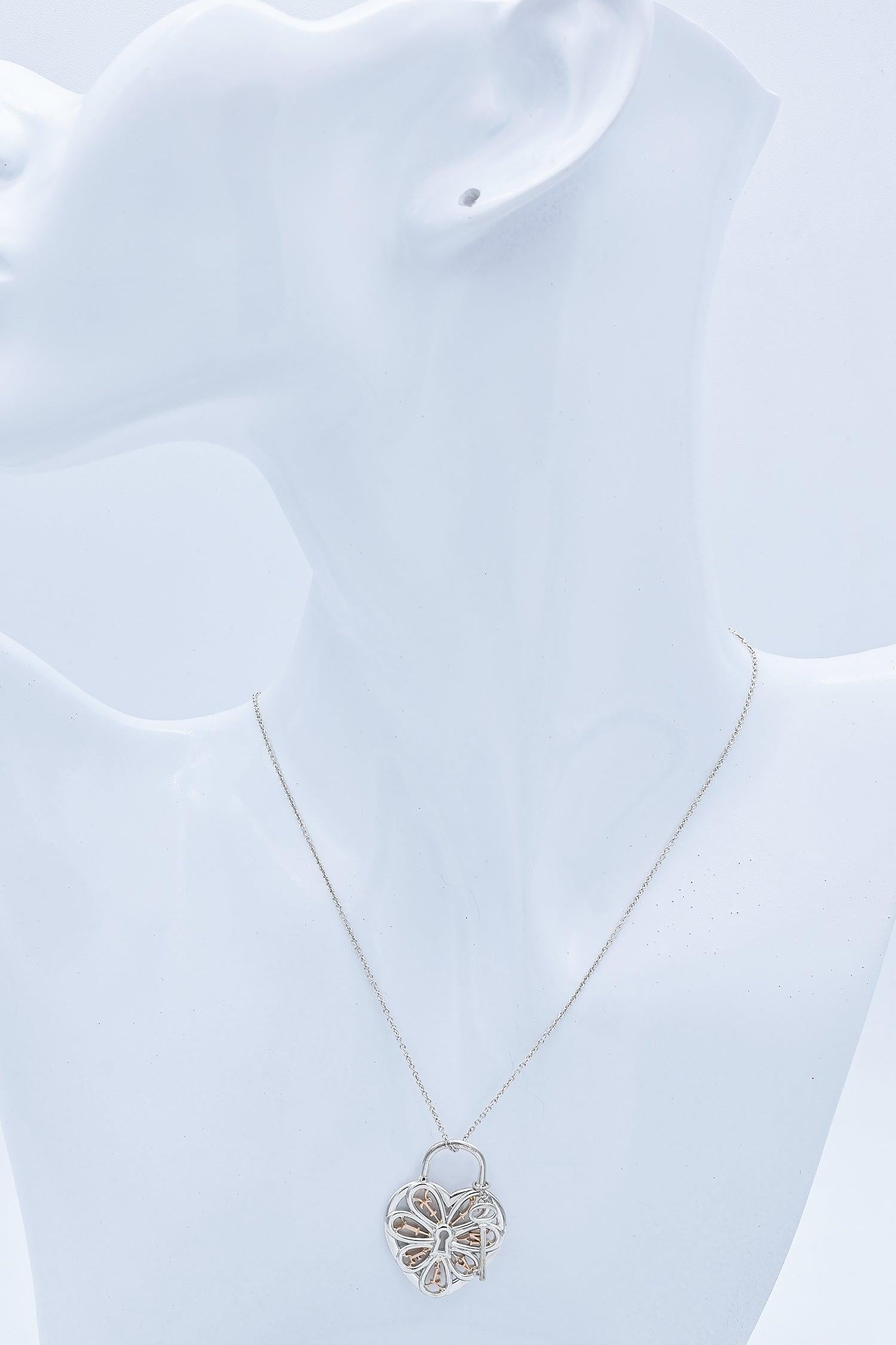 Tiffany & Co. Sterling Silber & 18K Rose Gold Herz & Schlüssel Anhänger Halskette im Zustand „Gut“ im Angebot in New York, NY