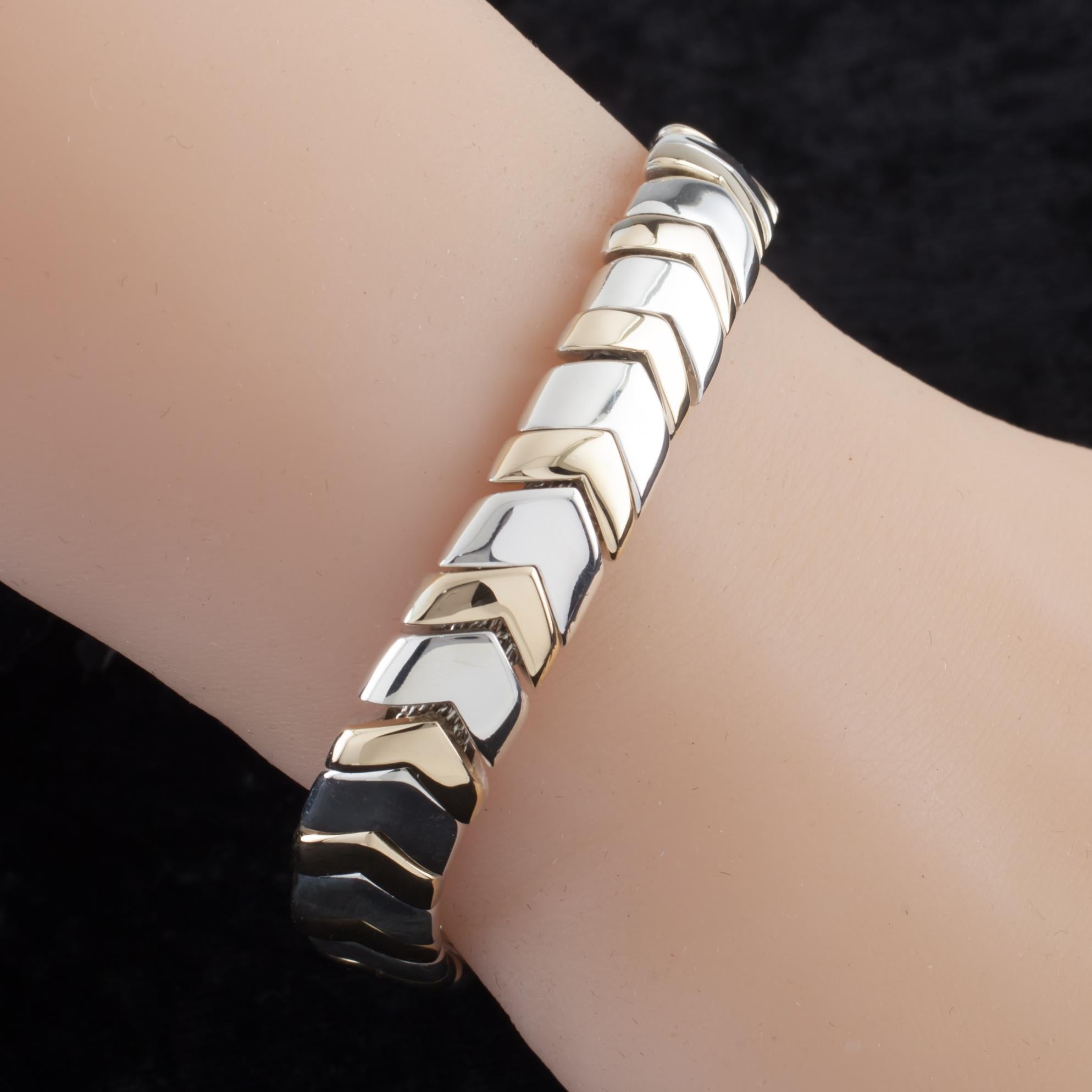 Gorgeous Tiffany & Co. Retired Bracelet
Features Chevron Pattern Articulating Beads Strung over Mesh Bracelet
Gold Links have Silver Bases, gold is applied on top of silver base.
Piece Hallmarked 