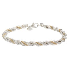 Tiffany 
Co. Sterling Silver 
18K Yellow Gold Twisted Rope Chain Bracelet