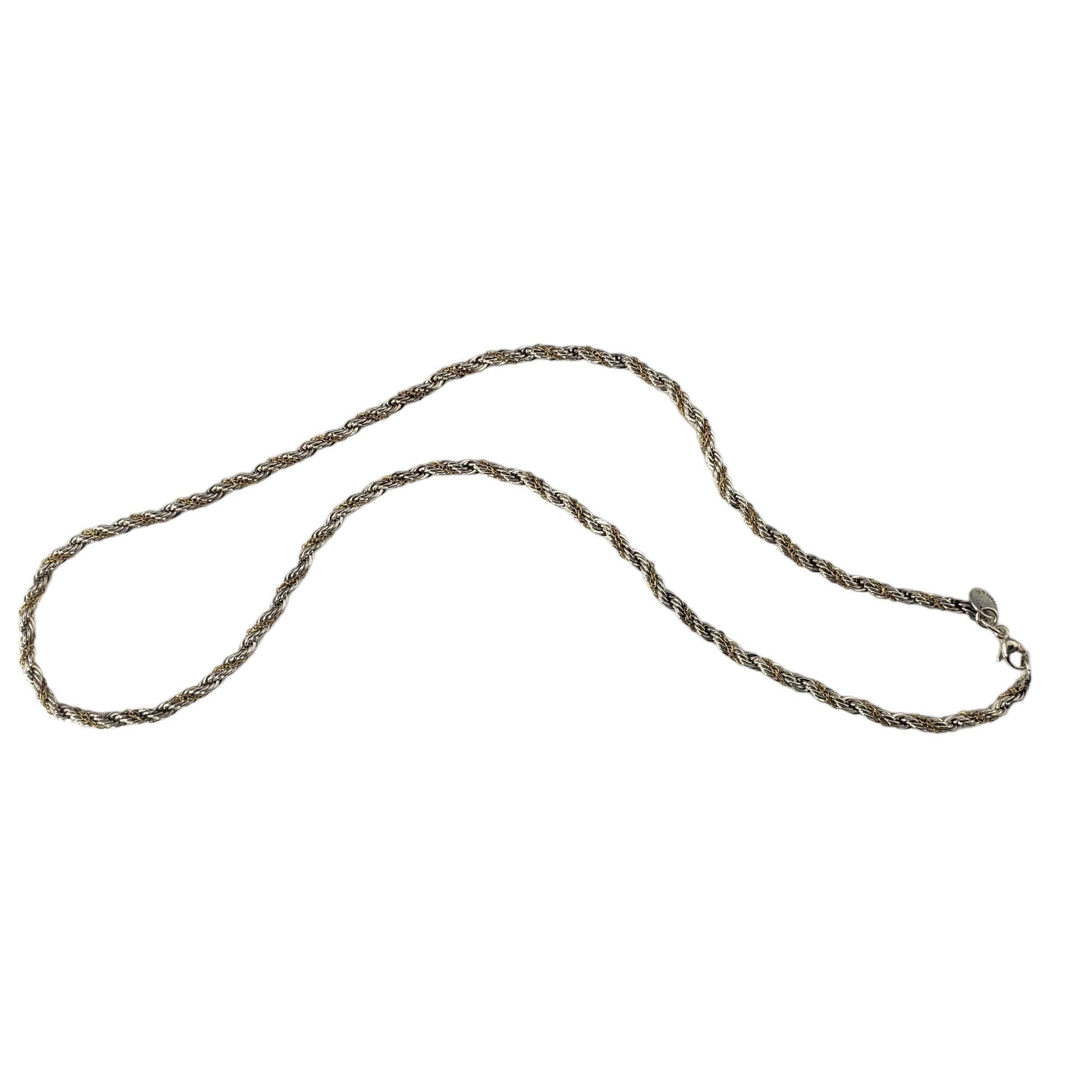 Tiffany & Co. Sterling Silver 18K Yellow Gold Twisted Rope Necklace-

This elegant rope necklace is crafted in beautifully detailed sterling silver and 18K yellow gold by Tiffany & Co.

Width: 3 mm.

Size: 18 inches

Hallmark: 925  750  Tiffany &
