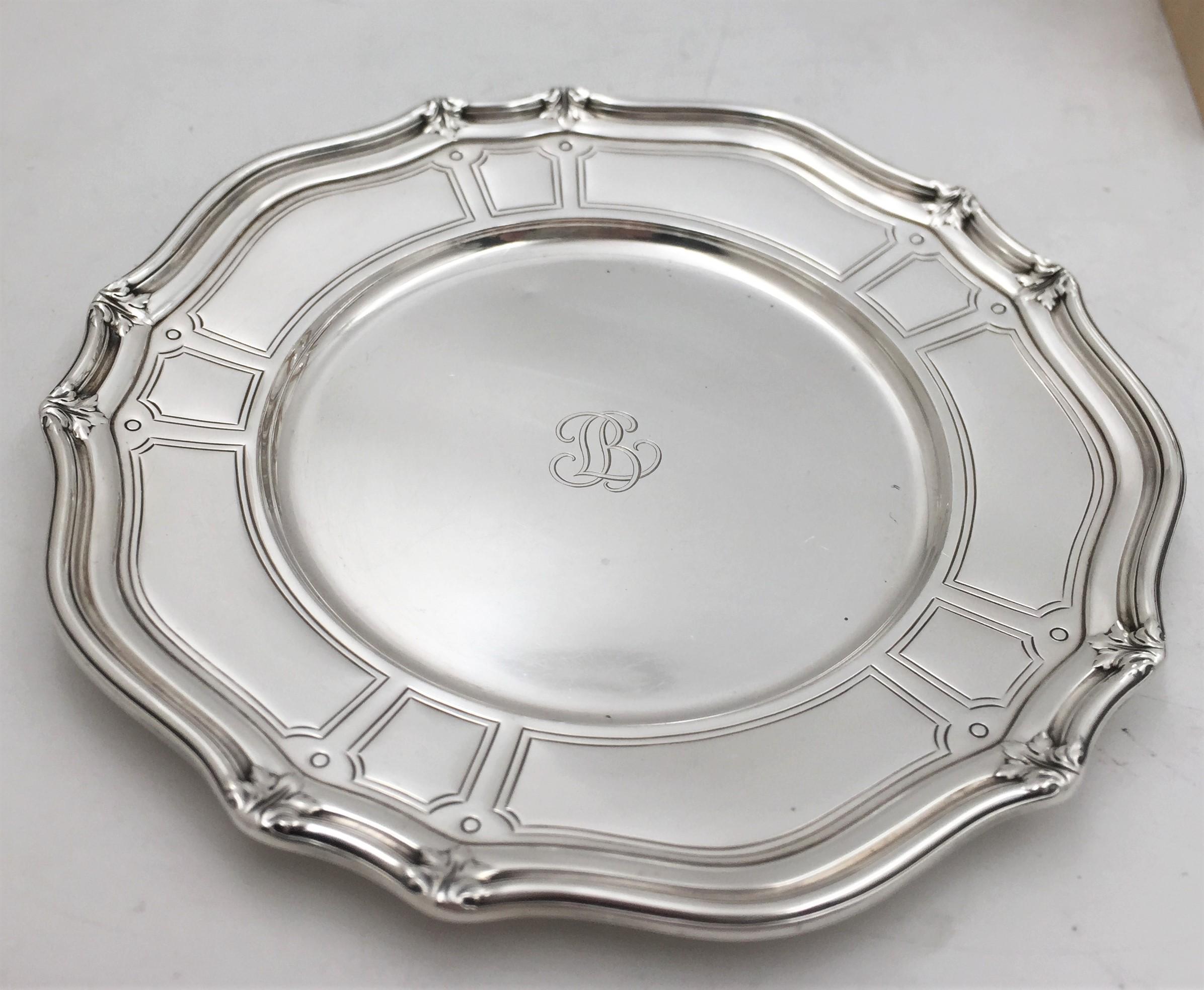 Tiffany & Co. sterling silver set of 6 dessert Plates/ dishes in St. Dunstan pattern number 17459 from 1909. Each measures 7 1/2'' in diameter by 5/8'' in height and bears hallmarks and a monogram as shown. Total weight is 54.5 troy ounces. 

The