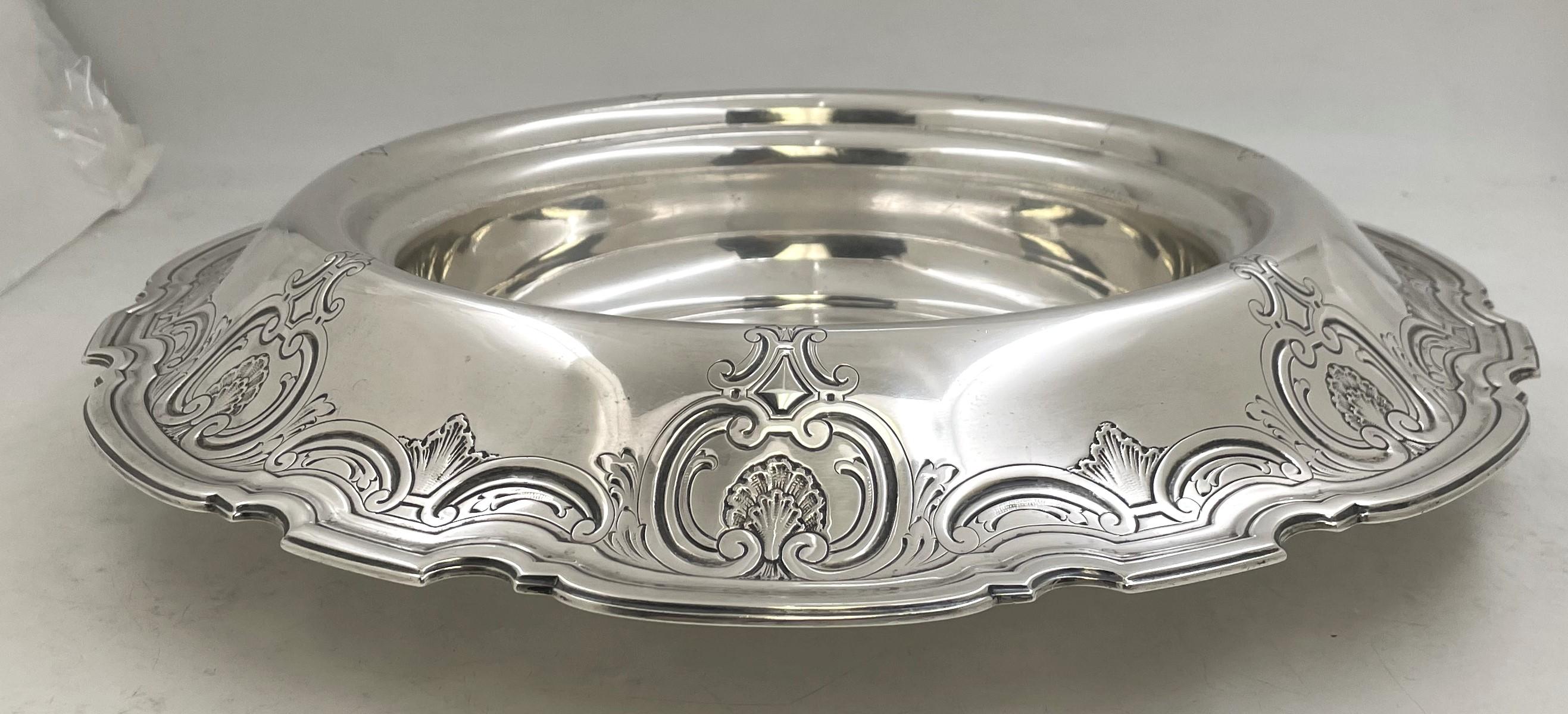 Tiffany & Co large sterling silver centerpiece bowl in pattern number 19839G from 1921 and in the celebrated Kings pattern. Designed with a turned-over rim, decorated with a scroll border and cartouches, it measures 17'' in diameter (inner diameter
