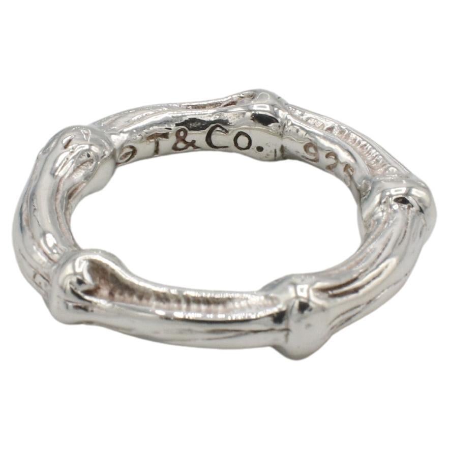 Tiffany & Co. Sterling Silver Bamboo Band Ring 1996
Metal: Sterling silver 925
Weight: 4.65 grams
Size: 4.25 (US)
Width: 4mm
AT F35000029
