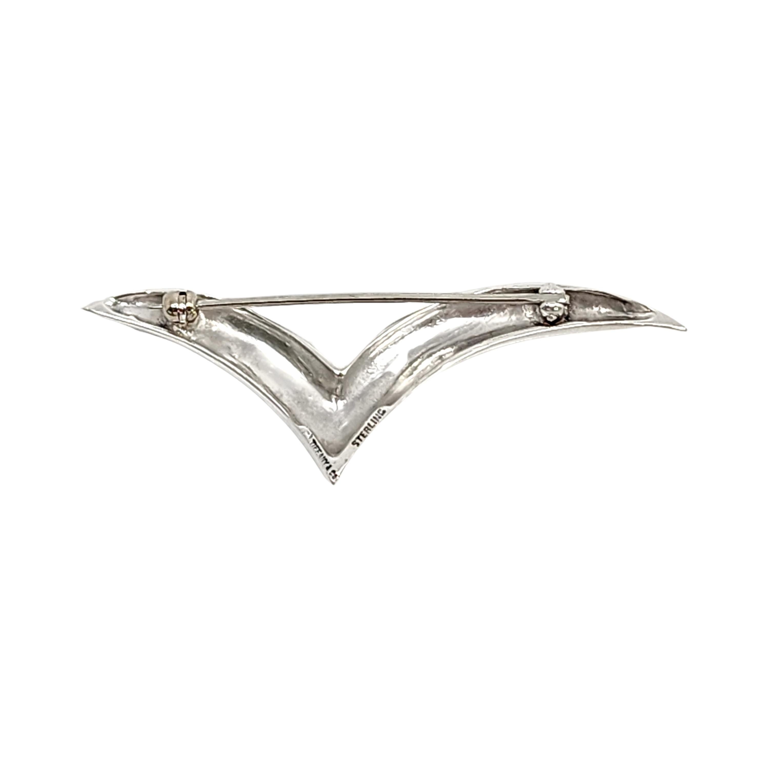 Tiffany & Co sterling silver seagull pin/brooch, circa 1980s.

Tiffany vintage flying seagull design pin in the larger size. Does not include Tiffany & Co box or pouch.

Measures approx 2