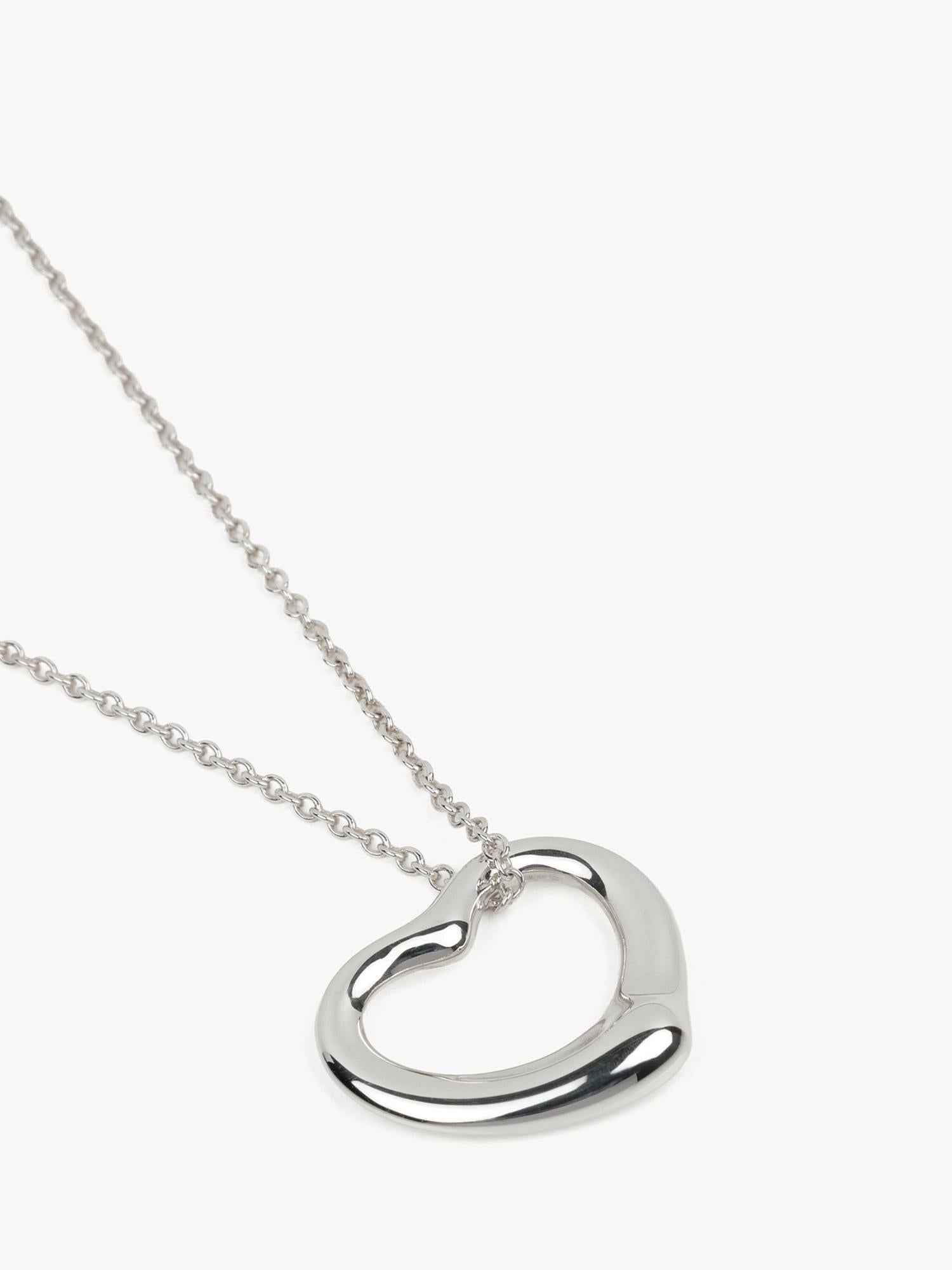 Tiffany & Co. Pendentif coeur ouvert Elsa Peretti en argent sterling 22 mm

Détails du produit
Xupes Ref : J1559
Marque : Tiffany & Co.
Modèle : Pendentif en forme de cœur ouvert de 22 mm
Type : Collier
PRIX DE VENTE CONSEILLÉ : £530
Matériau(x) :