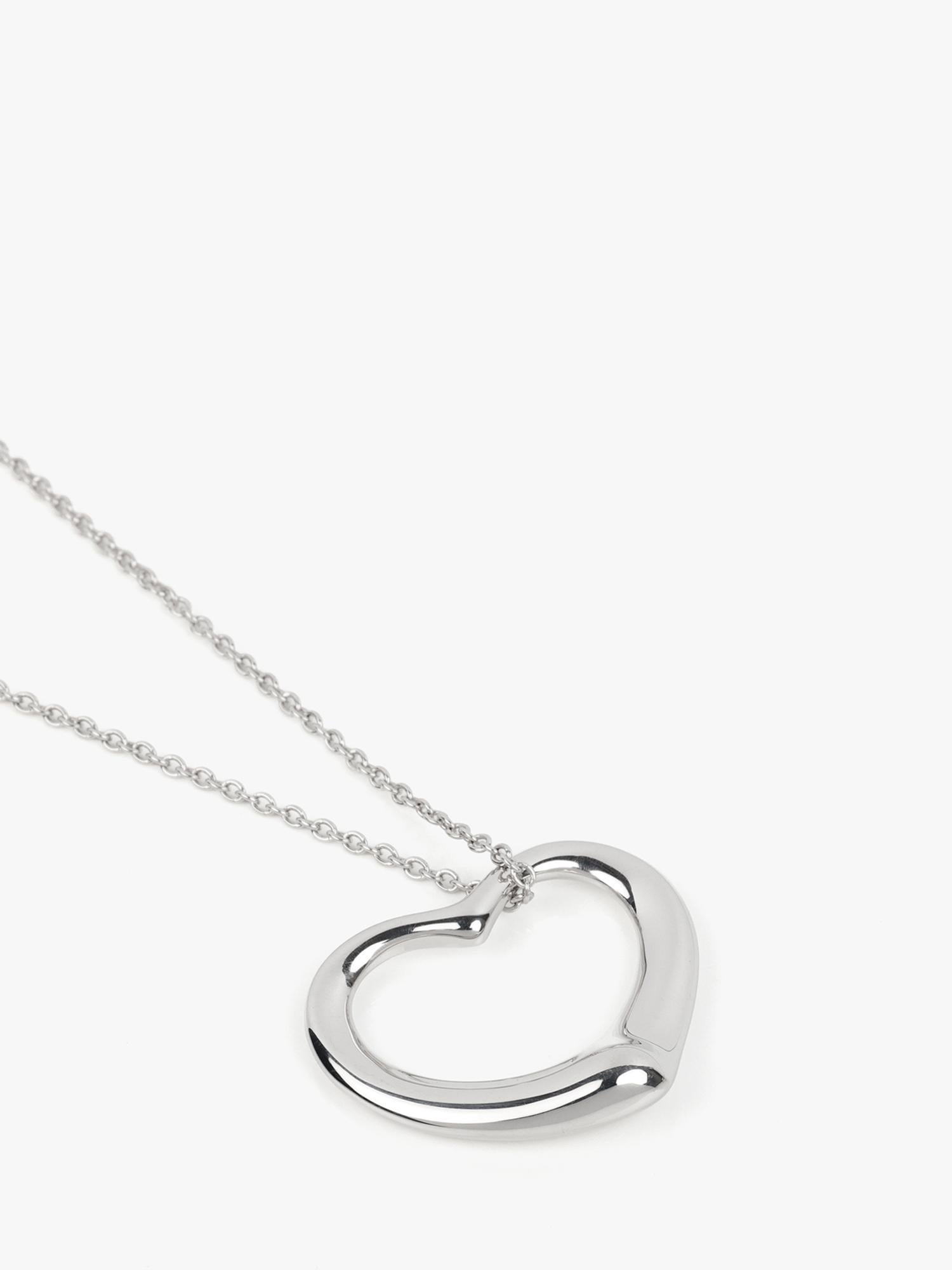 Tiffany & Co. Pendentif coeur ouvert Elsa Peretti en argent sterling 27 mm

Détails du produit
Xupes Ref : J1578
Marque : Tiffany & Co.
Modèle : Pendentif coeur ouvert 27mm
Type : Collier
PRIX DE VENTE CONSEILLÉ : 670
Matériau(x) : Argent