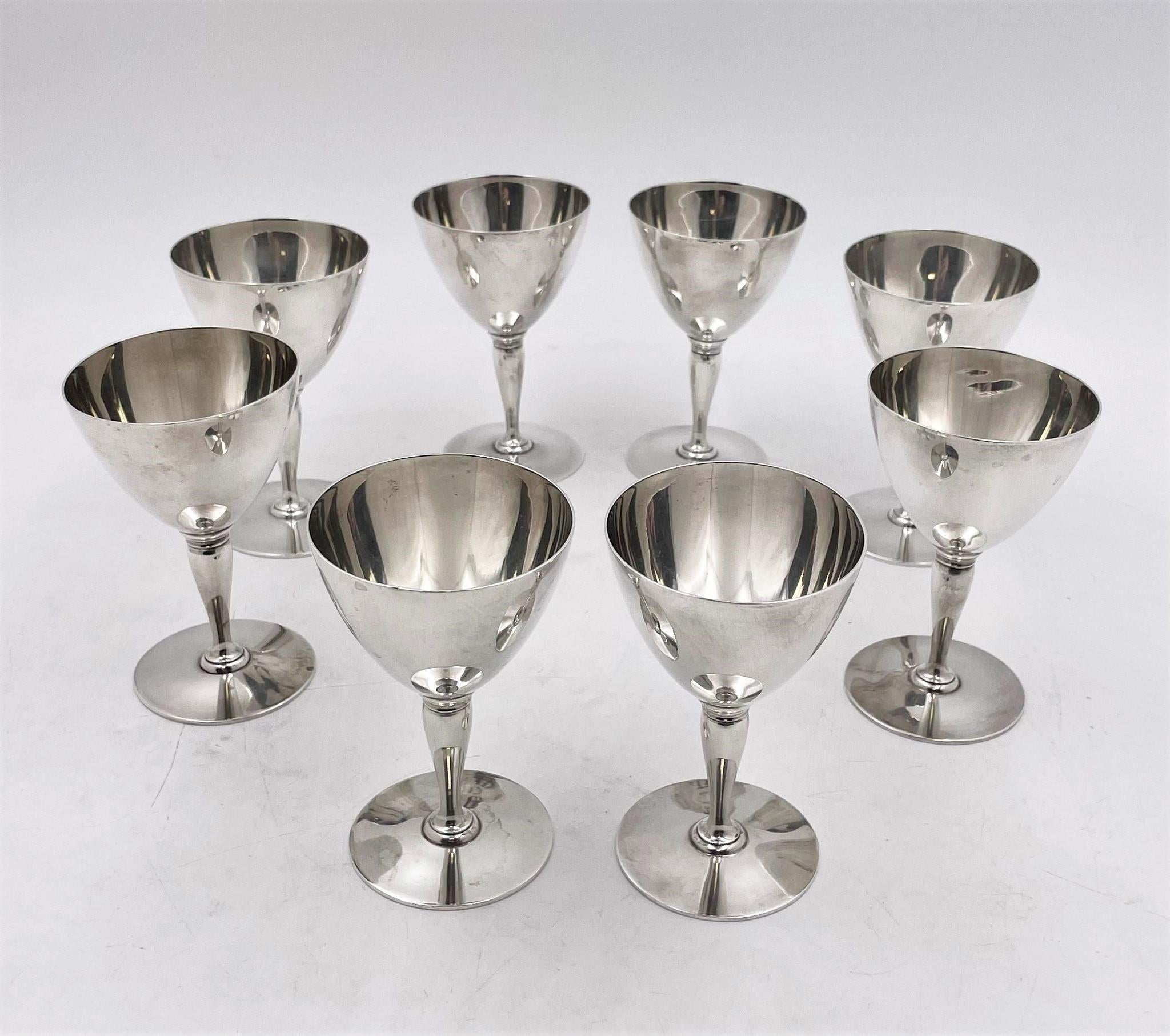 Tiffany & Co. sterling silver 8-piece set of goblets (4 in x 2.5 in) in elegant Art Deco style. It has a beautiful, tampered stem and a circular base. It's from 1915 and weighs 30.4 oz.

Founded in 1837 by Charles Lewis Tiffany and John B. Young