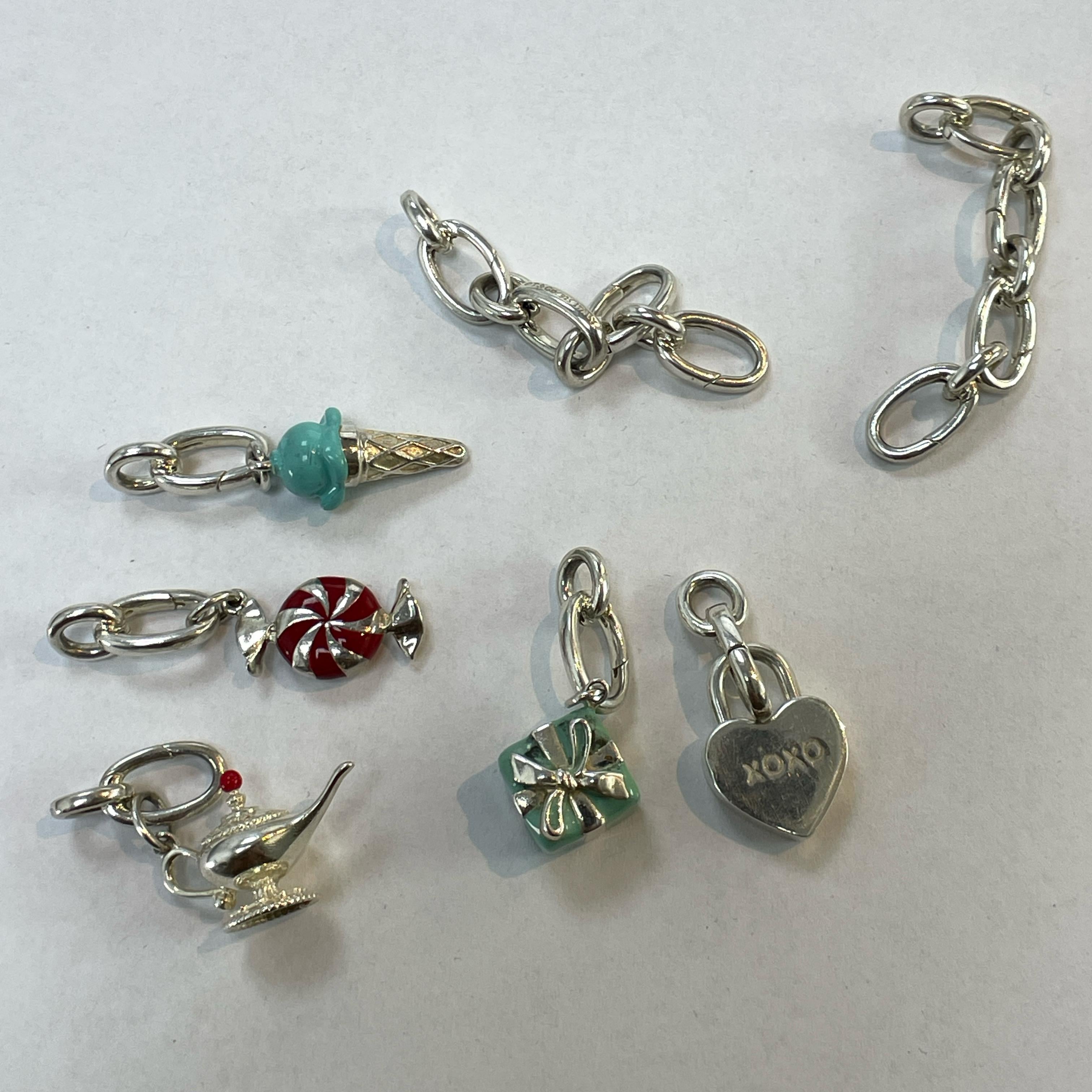 Tiffany & Co. Bracelet en argent 925 avec breloques multiples Unisexe en vente