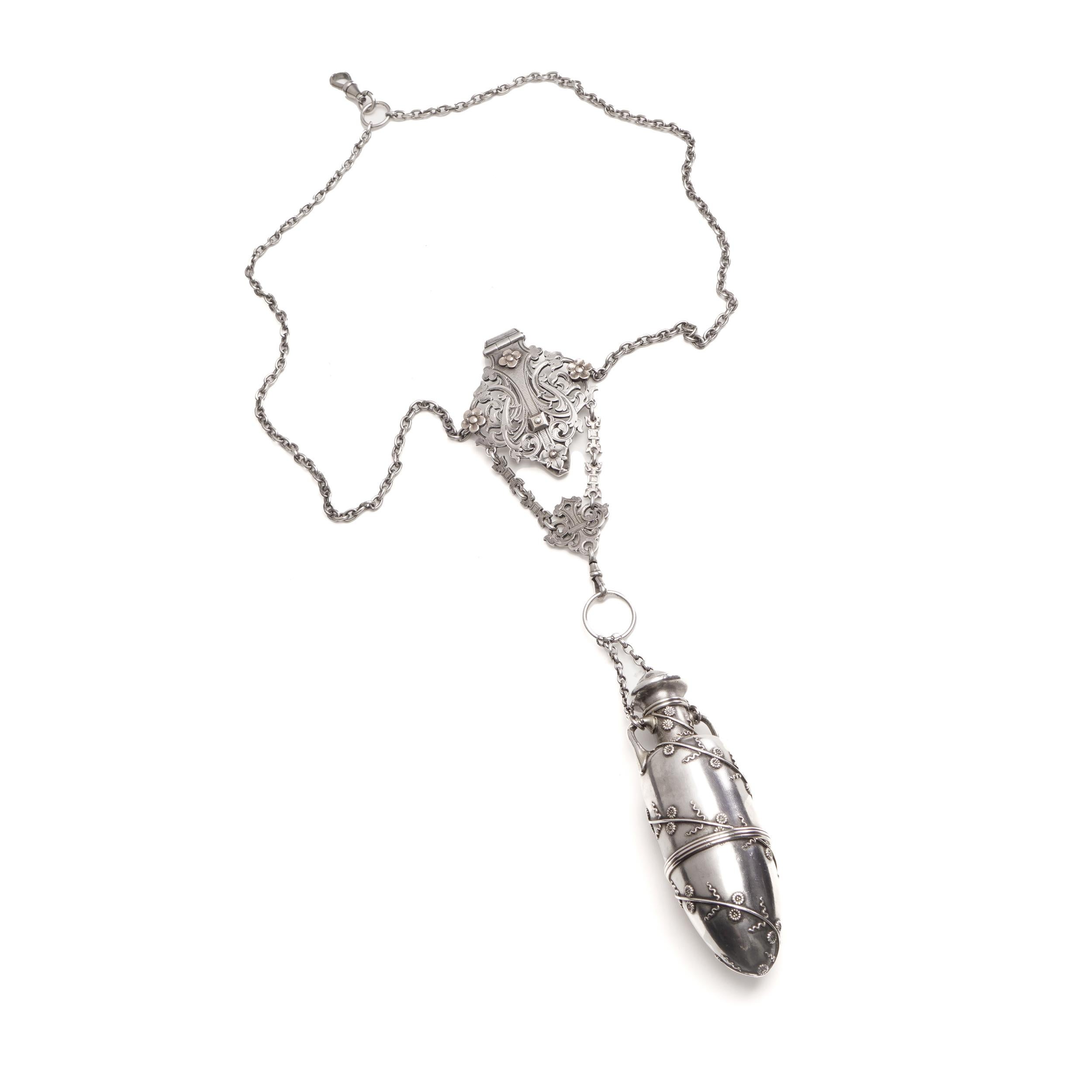Tiffany & Co. Sterling Silver Amphora Scent Bottle with Vinaigrette Aperture
American, circa 1850s  Mark of Edward C. Moore for Tiffany & Co.

A rare and important Tiffany & Co. sterling silver scent bottle, circa 1850s, attributed to Edward C.