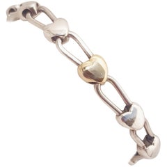 Tiffany & Co. Sterling Silver and 18 Karat Gold Inline Hearts Bracelet