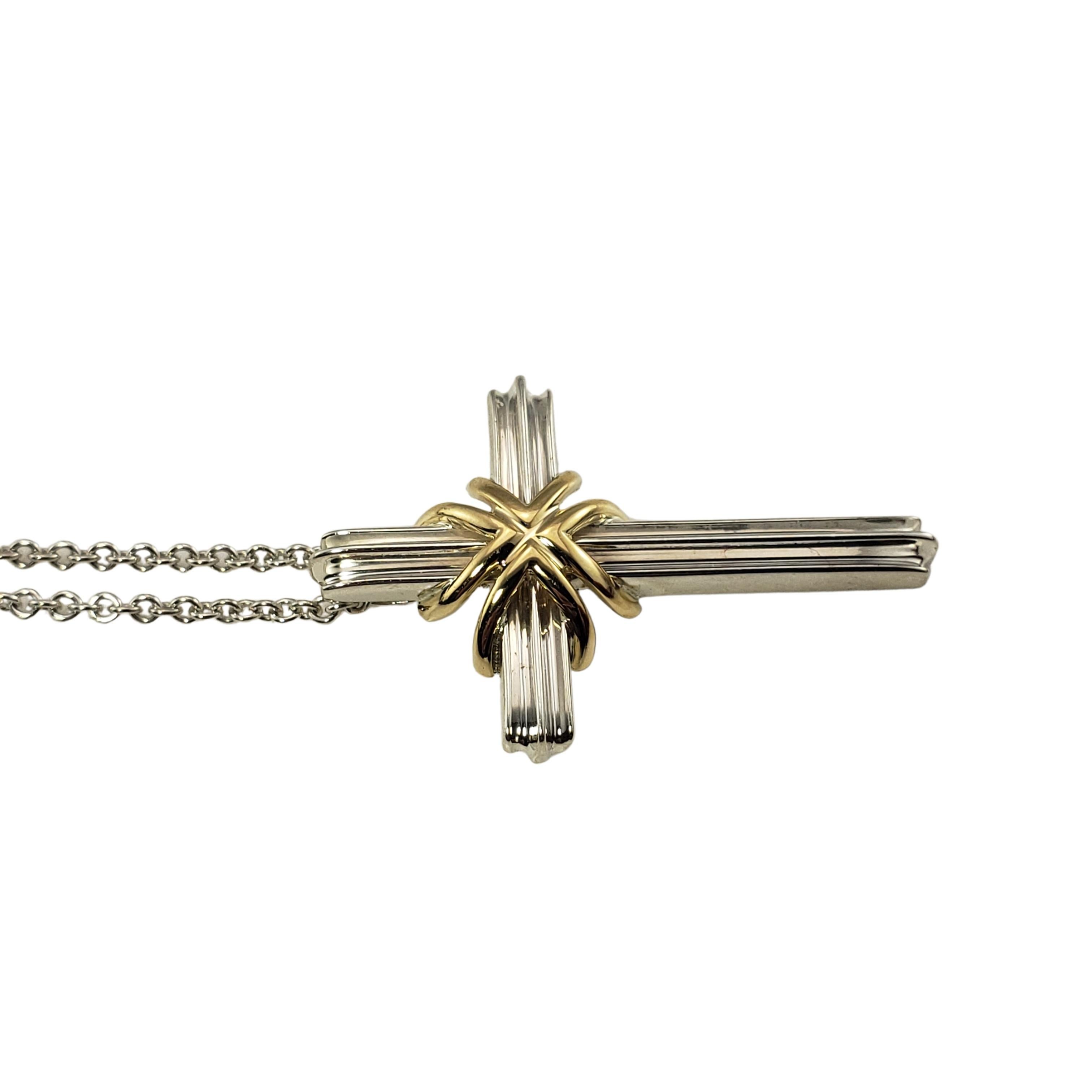 Tiffany & Co. Sterling Silver and 18 Karat Yellow Gold Cross Pendant Necklace In Good Condition In Washington Depot, CT