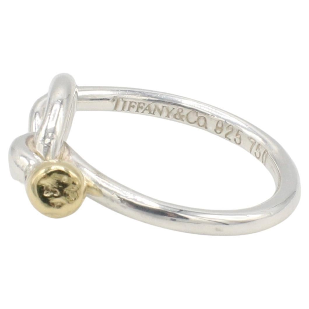 Contemporary Tiffany & Co. Sterling Silver and 18K Yellow Gold Love Knot Ring