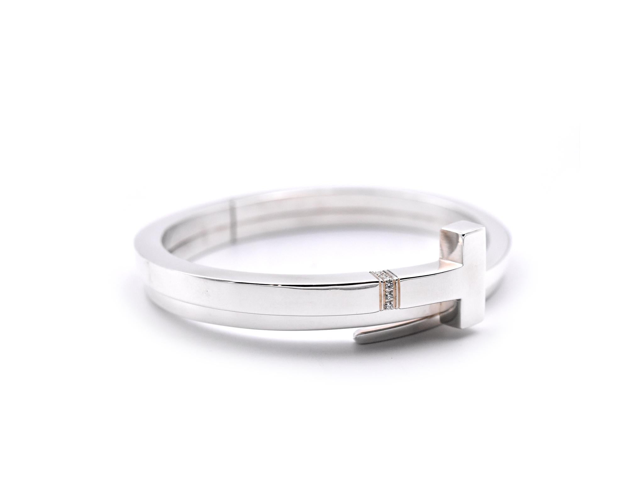 Designer: Tiffany & Co.
Material: sterling silver
Diamonds: 9 round brilliant cuts = 0.10cttw
Dimensions: bracelet measures 7.15mm in width and will fit a 6 ½ inch wrist
Weight: 51.50 grams
