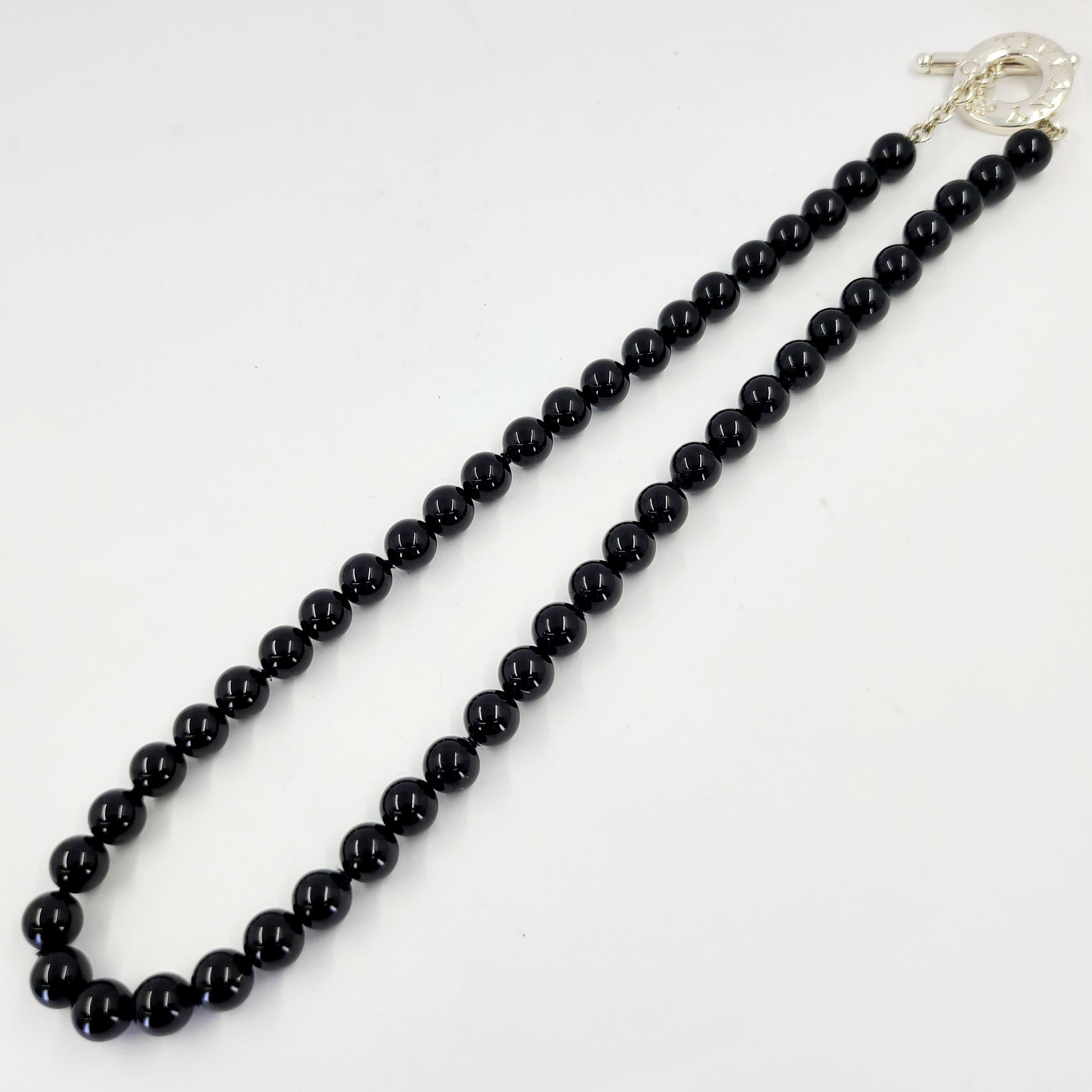 Tiffany and Co Sterling Silver Necklace Featuring 8mm Onyx Beads and Toggle Clasp. 17.5 Inch Length. $575 MSRP.