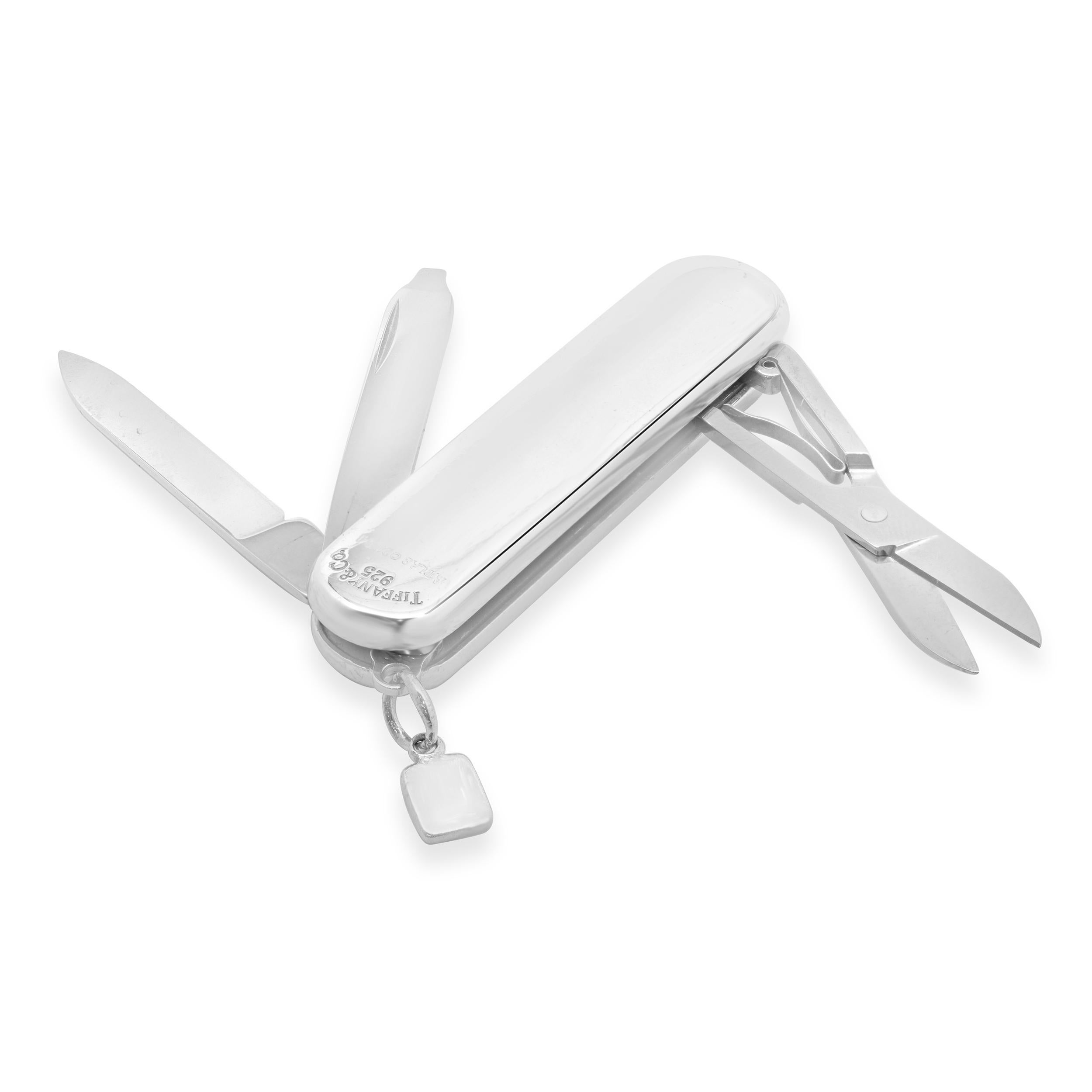 Designer: Tiffany & Co. 
Material: sterling silver
Dimensions: pocket knife measures 58.5 x 17.5mm
Weight: 45.36 grams

