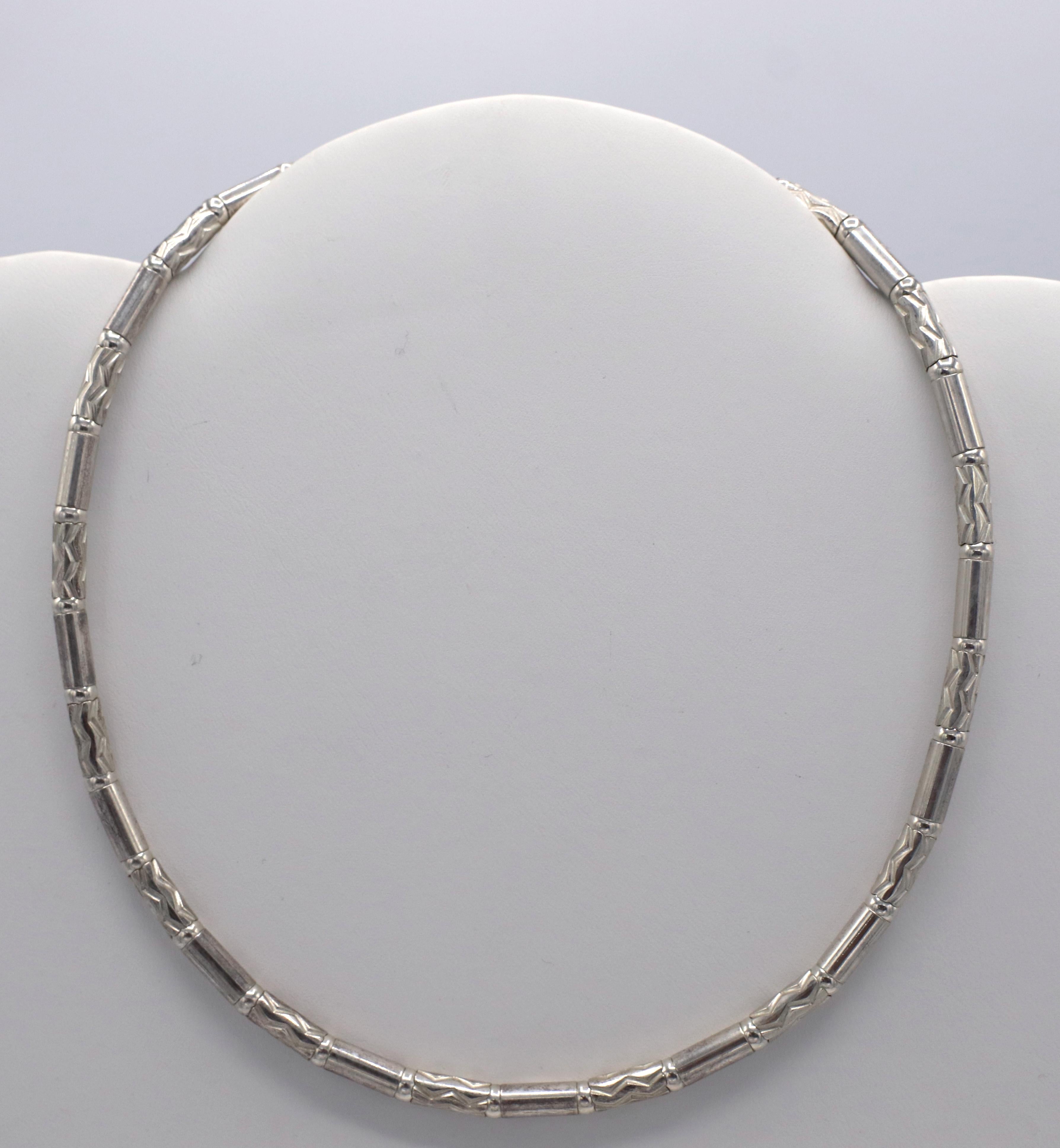Tiffany & Co. Sterling Silver Aztec Etched Zig Zag Necklace 
Metal: Sterling Silver 925
Weight: 43 grams
Length: 16 inches
Width: 4.4mm
Signed: Tiffany & Co. Germany 925 
