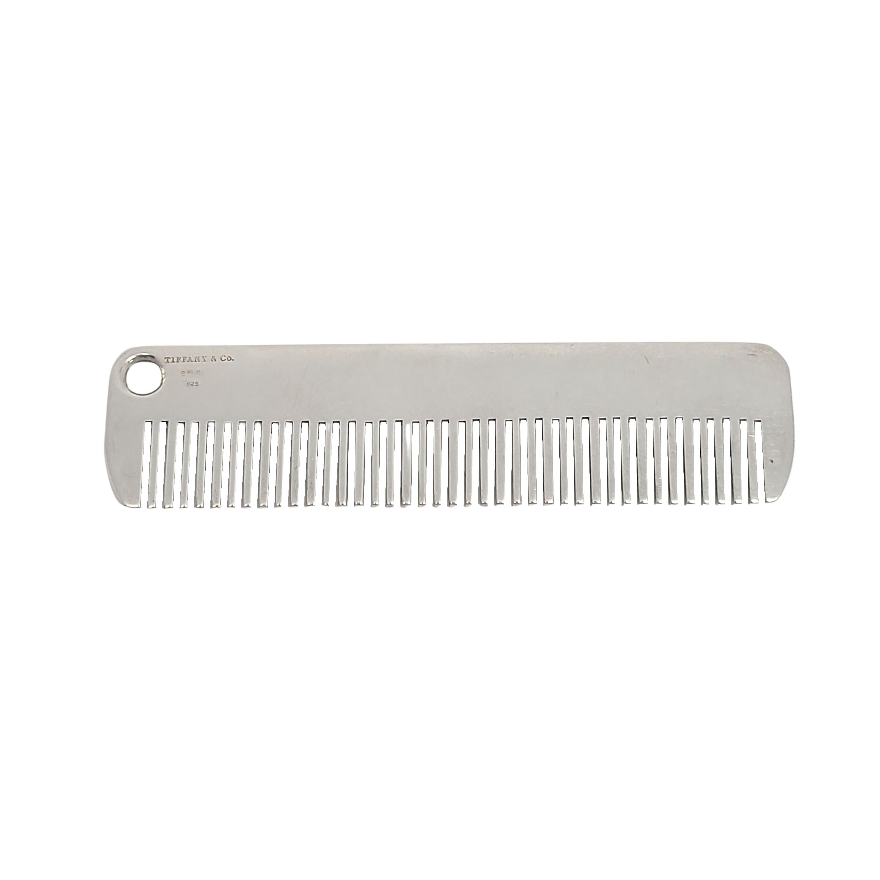 Sterling silver baby comb by Tiffany & Co.

No monogram or engraving.

A simple and timeless classic polished design by Tiffany & Co. Tiffany pouch and box not included.

Measures approx 3 1/8