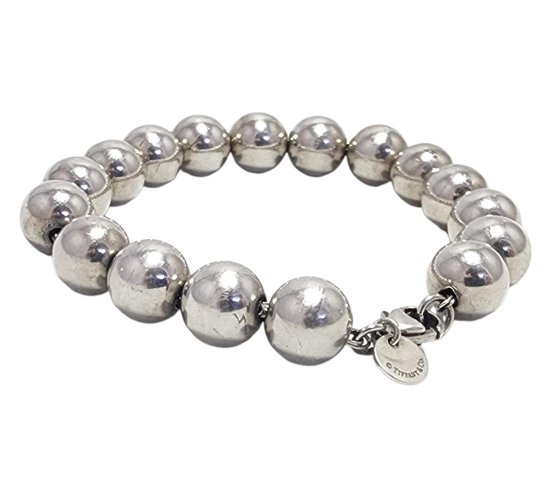 Tiffany & Co Sterling Silver Ball Bead Bracelet

This design from Tiffany & Co with sterling silver ball beads is a perfect classy addition to any collection!

Hallmark: Tiffany & Co 925

Weight: 18.6g/ 12dwt

Size: 7.25