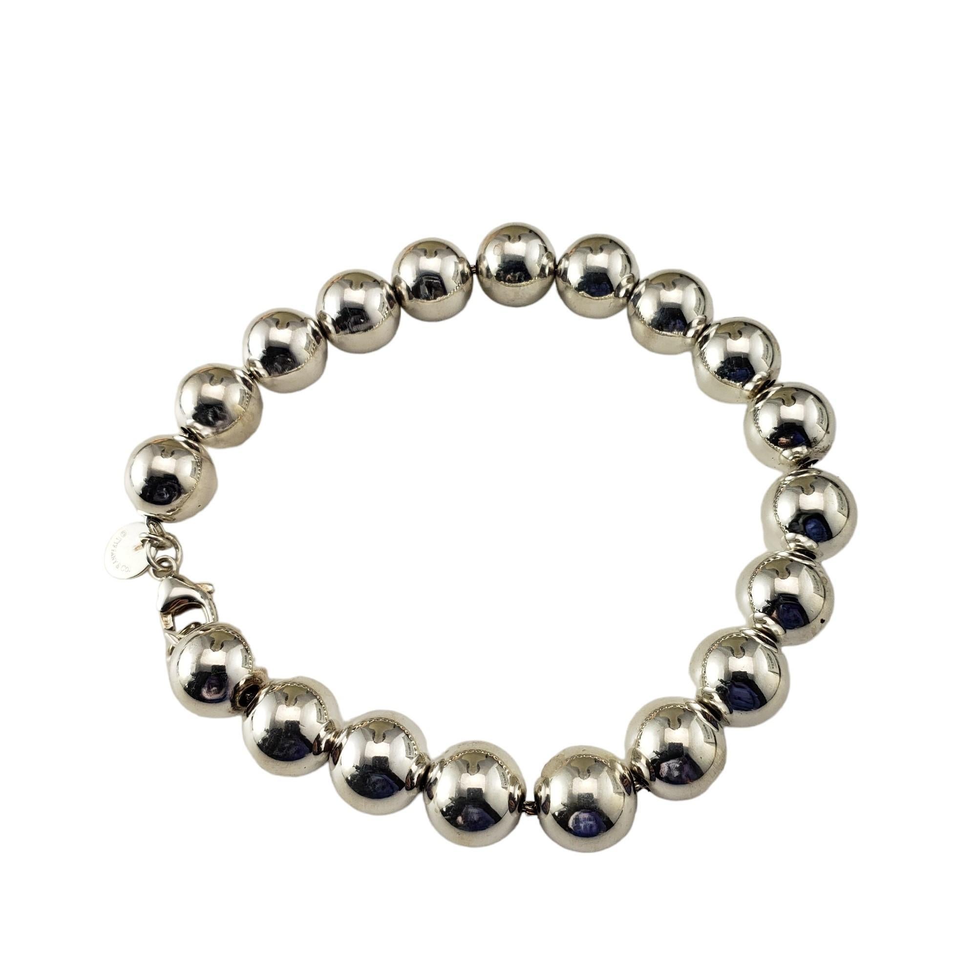 Vintage Tiffany & Co. Sterling Silver Ball Bracelet

This lovely bracelet by Tiffany & Co. is crafted in classic sterling silver.  

Width:  10 mm.

Matching  necklace: #17162
Matching earrings: #17163

Size:  7.25 inches

Stamped: TIFFANY & CO.