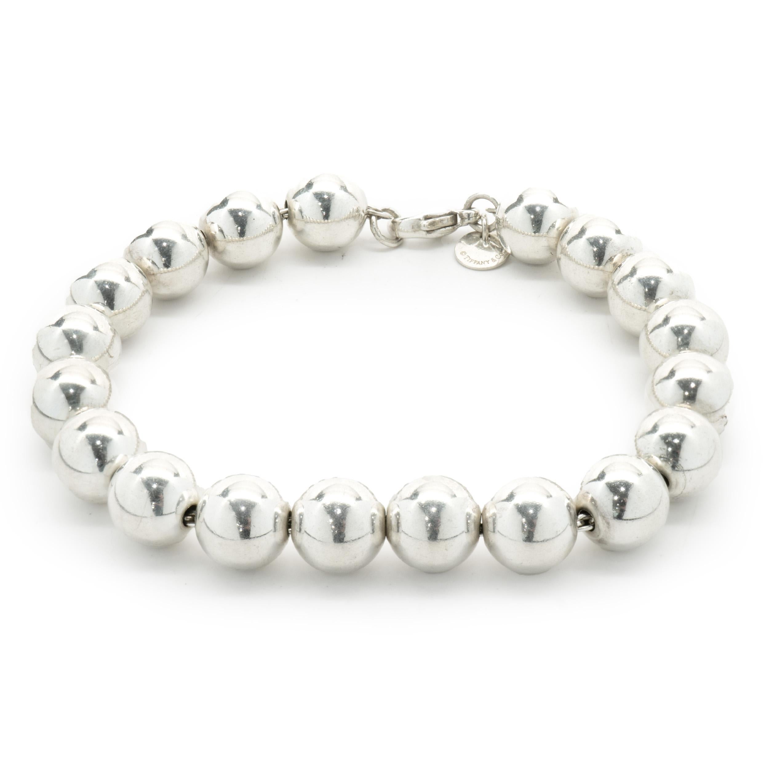 Designer: Tiffany & Co. 
Material: sterling silver
Dimensions: bracelet measures 8-inches in length
Weight: 21.07 grams